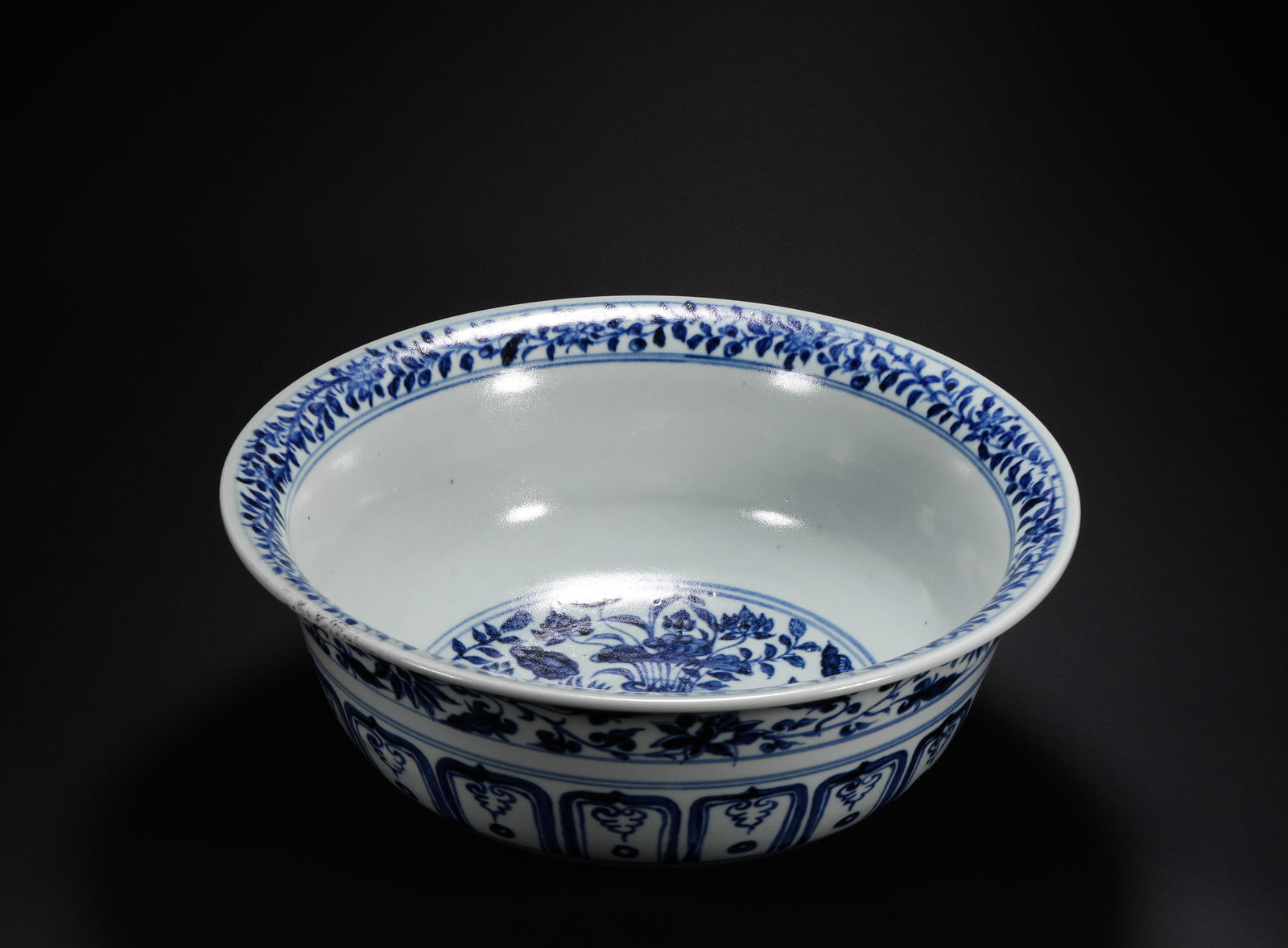 YUAN BLUE AND WHITE LOTUS BOWL WITH MANDARIN DUCKS PLAYING IN WATER: Name YUAN BLUE AND WHITE LOTUS BOWL WITH MANDARIN DUCKS PLAYING IN WATER Dimensions H:12cmD29.6cm Condition Additional photographs and condition reports are available upon request a