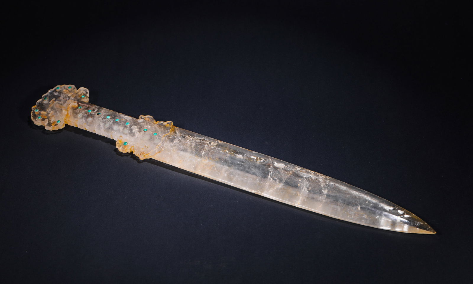 HAN DYNASTY CRYSTAL INLAID TURQUOISE SWORD-SHAPED ARTIFACT: Name HAN DYNASTY CRYSTAL INLAID TURQUOISE SWORD-SHAPED ARTIFACT Dimensions L: 48 CM; WEI GHT: 650 GTHIS IS A NATURAL CRYSTAL SWORD-SHAPED ARTIFACT INLAID WITH TURQUOISE, BELON GIN G TO THE CEREMONIAL