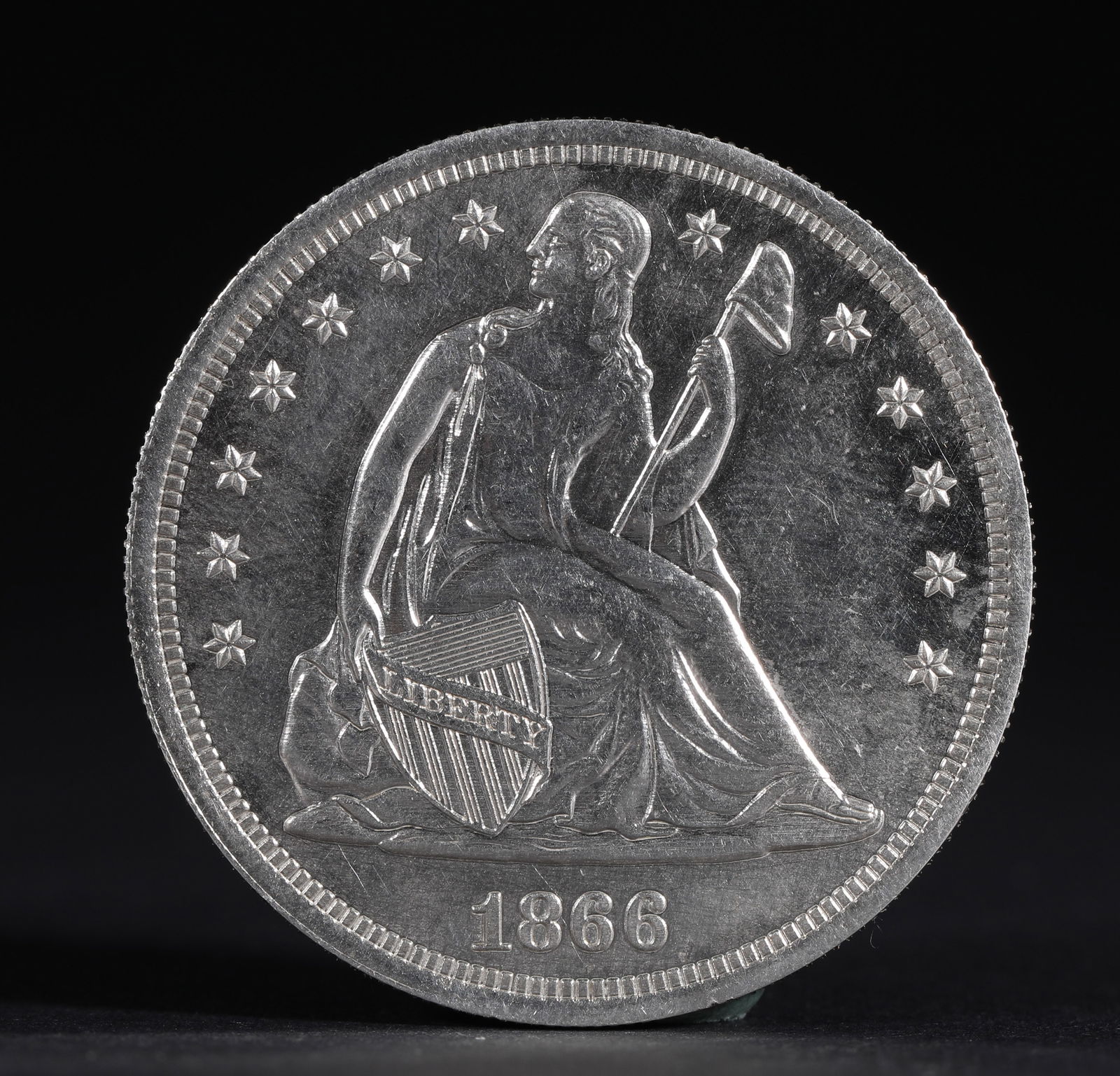 AMERICAN SEATED STATUE OF LIBERTY IN 1866 DOLLAR (1 of 3)
