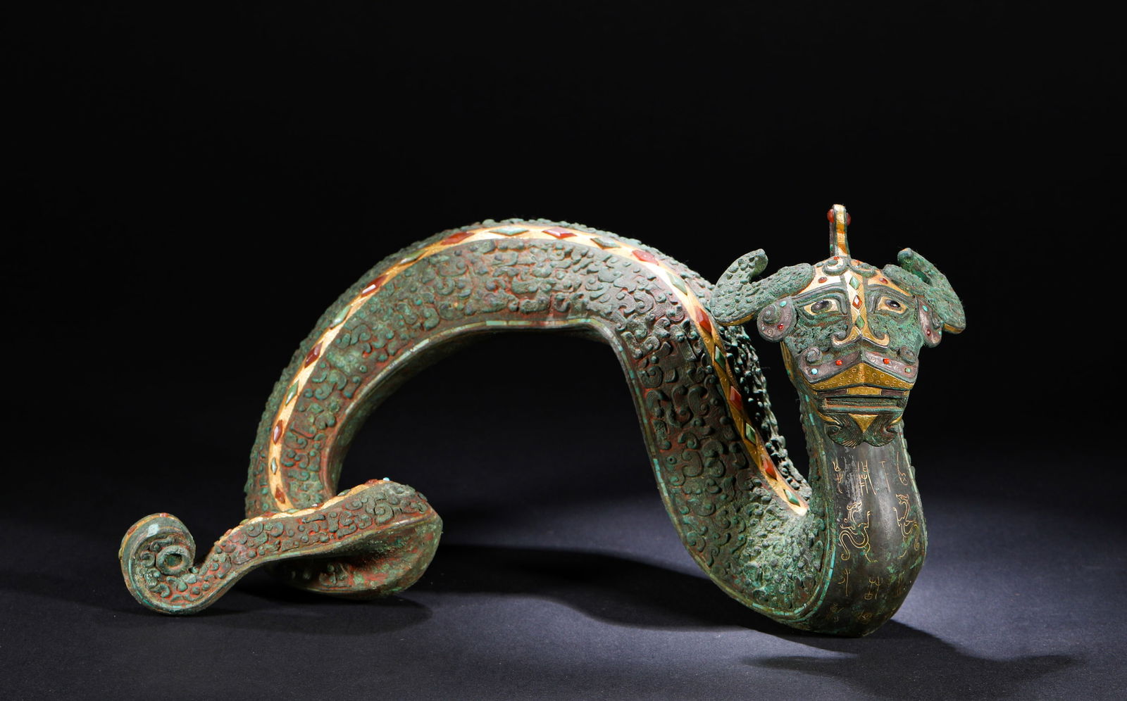 IN THE HAN DYNASTY, COPPER CRUSHED GOLD AND SILVER DRAGONS (1 of 9)