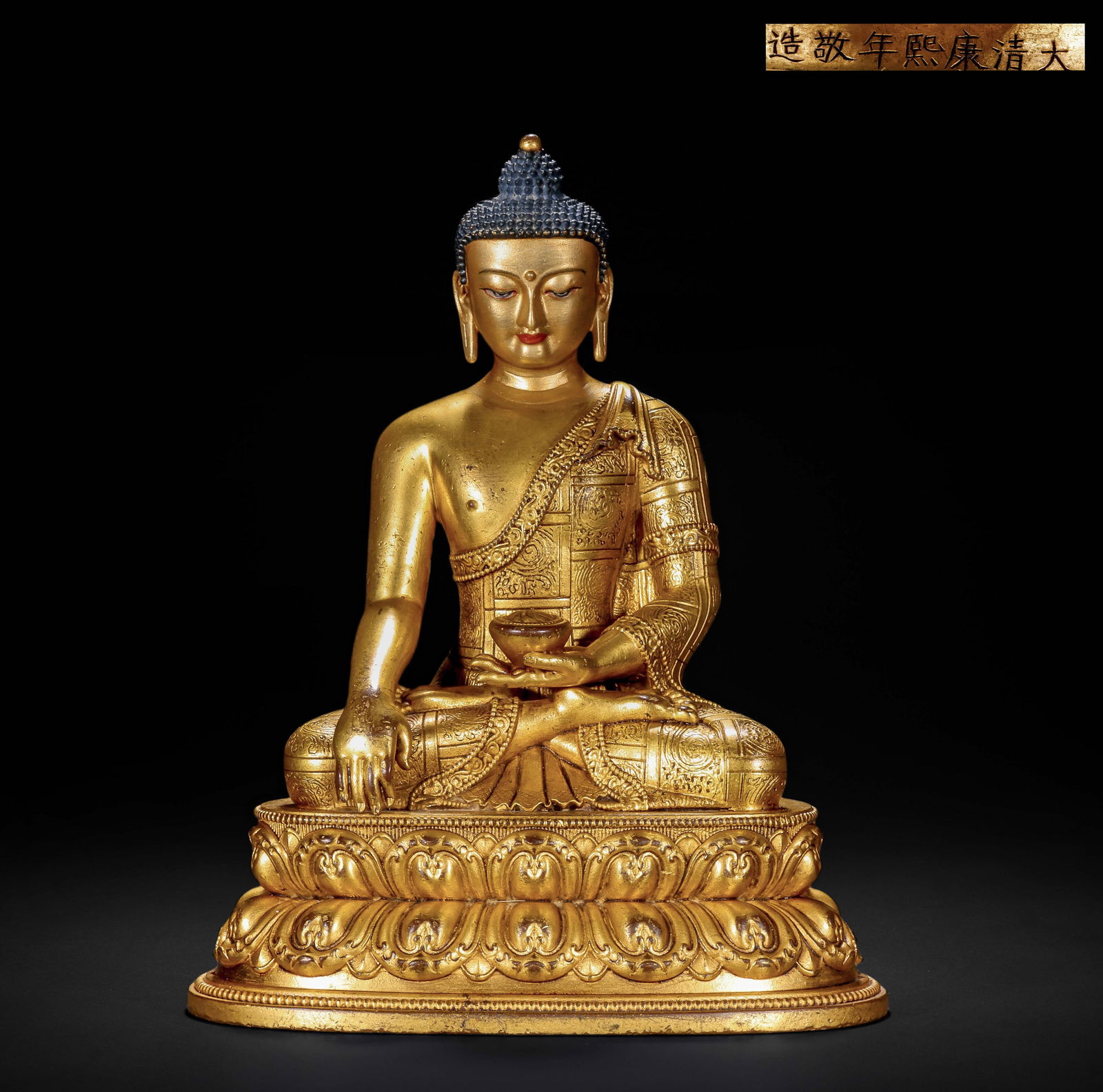 A GILDED BRONZE STATUE OF SAKYAMUNI BUDDHA FROM THE KANGXI PERIOD OF THE QING DYNASTY (1 of 13)