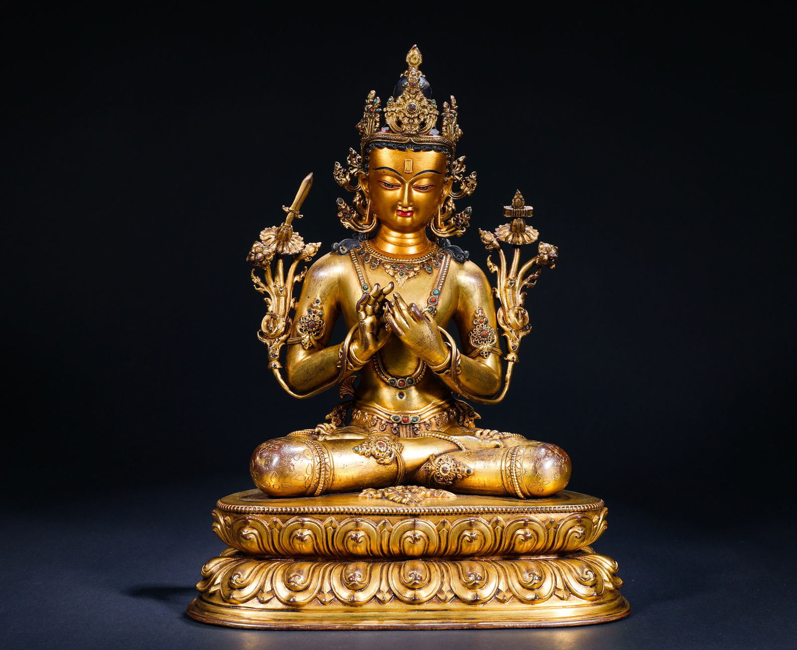 A GILDED BRONZE SEATED STATUE OF MANJUSRI BODHISATTVA FROM THE MING DYNASTY: Name A GILDED BRONZE SEATED STATUE OF MANJUSRI BODHISATTVA FROM THE MING DYNASTY Dimensions H: 34 CM; W: 25.5 CM; WEI GHT: 4380 GMANJUSHRI BODHISATTVA IS THE SYMBOL OF WISDOM IN BUDDHISM,