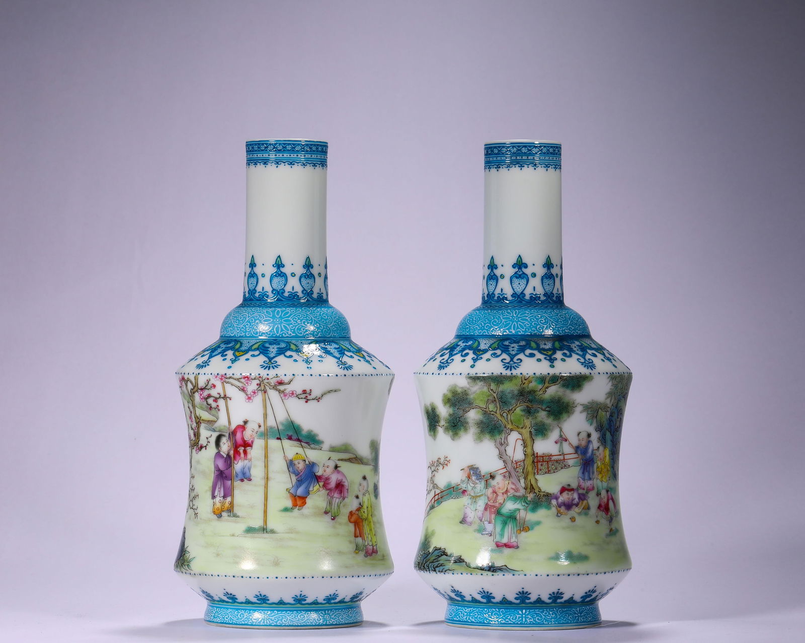 A PAIR OF ENAMEL APPRECIATION VASES FROM THE QING DYNASTY'S YONGZHENG PERIOD: Name A PAIR OF ENAMEL APPRECIATION VASES FROM THE QING DYNASTY'S YONGZHENG PERIOD Dimensions H: 19 CM; W: 9 CM Condition Additional photographs and condition reports are available up