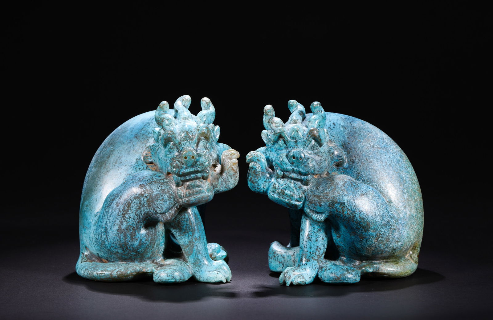 A PAIR OF HAN DYNASTY HETIAN JADE AUSPICIOUS BEASTS: Name A PAIR OF HAN DYNASTY HETIAN JADE AUSPICIOUS BEASTS Dimensions H: 12 CM; W: 9 CM; WEI GHT: 1980 G Condition Additional photographs and condition reports are available upon reque