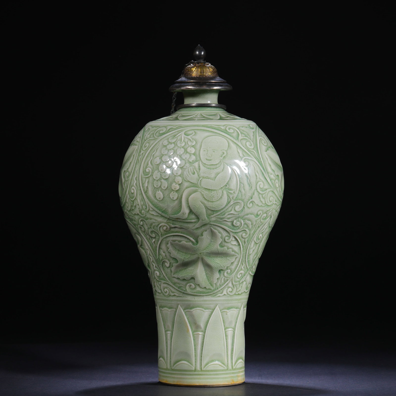 A SONG DYNASTY YAOZHOU KILN CELADON VASE ENGRAVED WITH FLOWER BABY PLAYING WITH GRAPE PATTERNS (1 of 9)