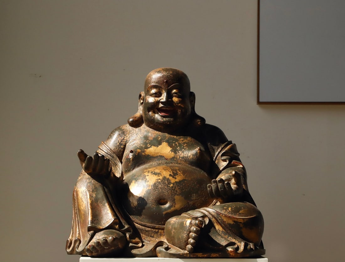 A GILDED BRONZE MAITREYA STATUE FROM THE MING DYNASTY (1 of 9)