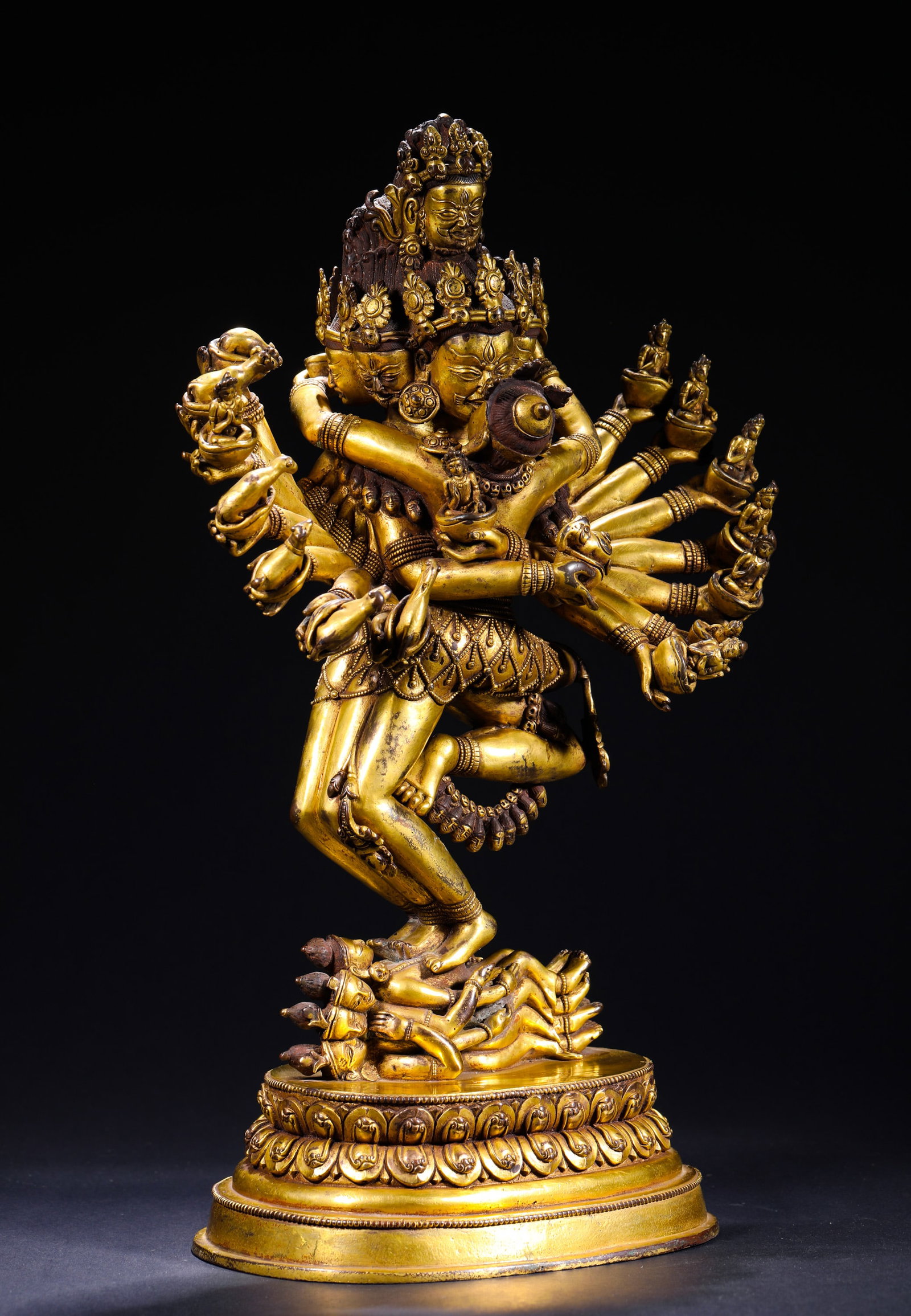 BRONZE GILDED VAJRA DOUBLE FIGURES FROM THE QING DYNASTY: Name BRONZE GILDED VAJRA DOUBLE FIGURES FROM THE QING DYNASTY Dimensions H:41cmW:23cmWeight:7950g This is a gilt-bronze statue of Kalachakra in Yab-Yum (union form). Cast in bronze and fully gilded, t