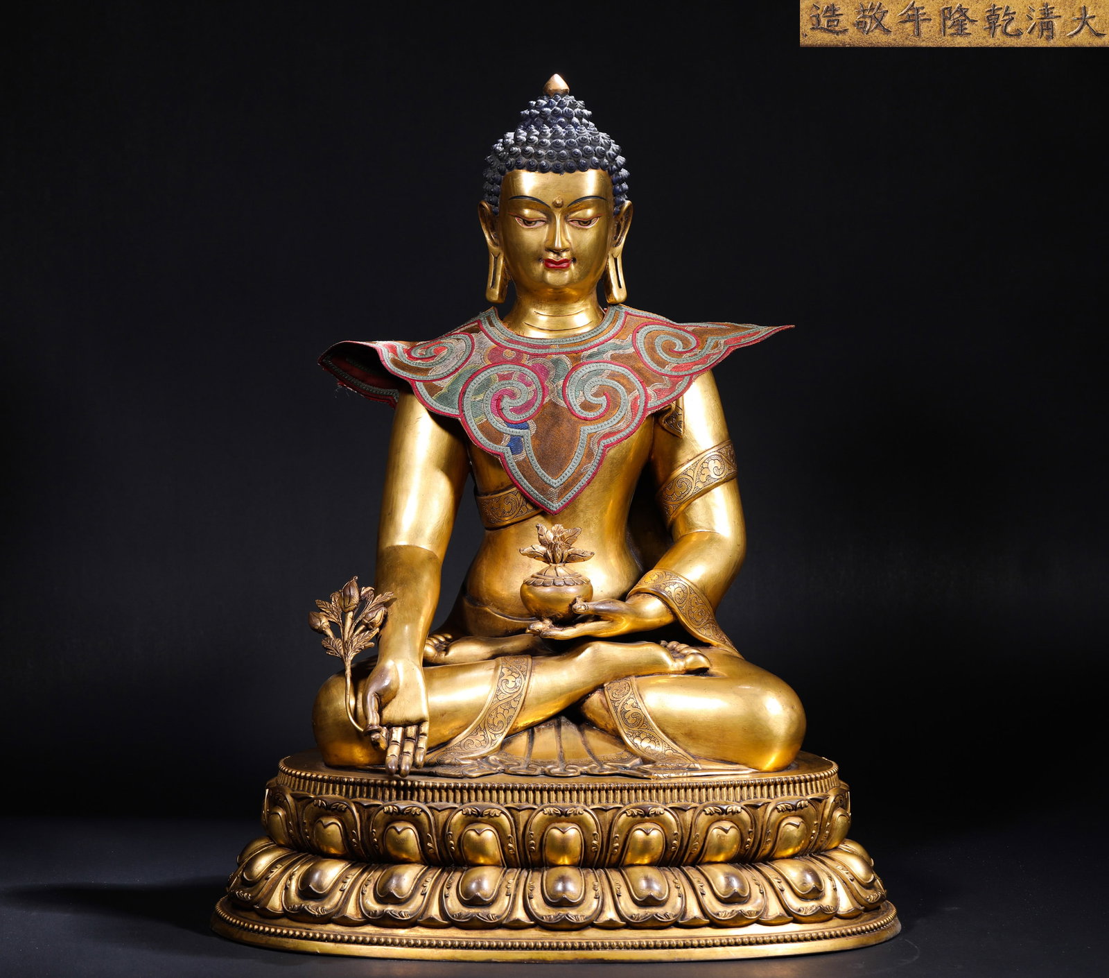 IN THE REIGN OF EMPEROR QIANLONG OF THE QING DYNASTY, A GILDED BRONZE SEATED STATUE OF THE MEDICINE (1 of 9)