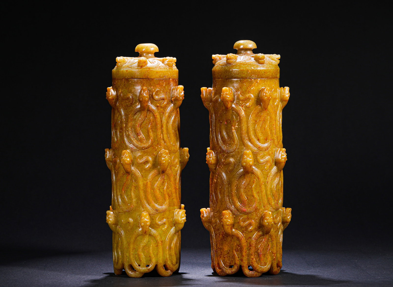 HAN DYNASTY HETIAN JADE INCENSE BOX: Name HAN DYNASTY HETIAN JADE INCENSE BOX Dimensions H:25cmW:8cmWeight:2300g This is a pair of cylindrical jade ornaments (or incense tubes) with carved interlocking chi-dragon patterns, featuring rich