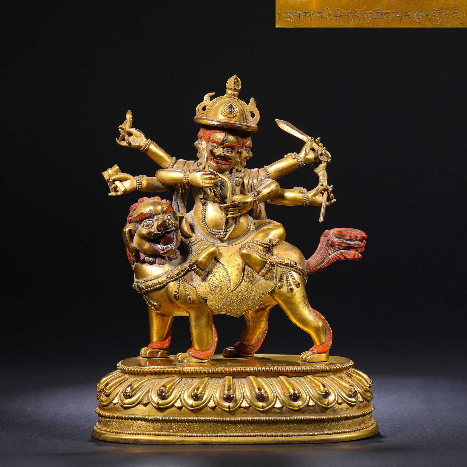 GILDED BRONZE OF THE QING DYNASTY, A SIX-ARMED WRATHFUL FIGURE RIDING A LION IN TIBETAN BUDDHISM (1 of 8)