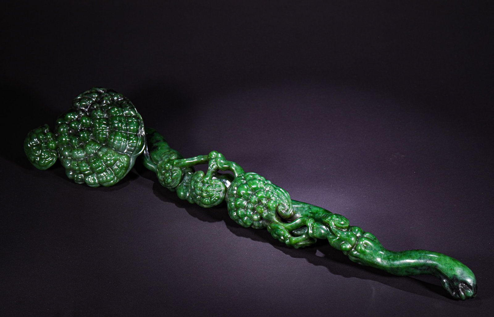 HETIAN JADE RUYI OF THE QING DYNASTY: Name HETIAN JADE RUYI OF THE QING DYNASTY Dimensions L:46cmWeight:1310g Condition Additional photographs and condition reports are available upon request as a courtesy to our clien