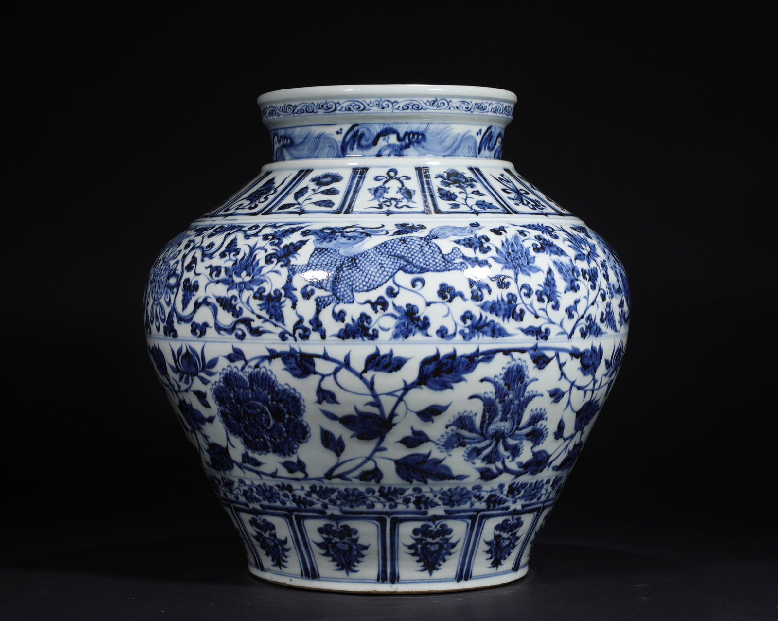 YUAN DYNASTY BLUE AND WHITE QILIN ENTWINED FLORAL PATTERN LARGE JAR: Name YUAN DYNASTY BLUE AND WHITE QILIN ENTWINED FLORAL PATTERN LARGE JAR Dimensions H:42cmD:40cm This is a large blue and white jar decorated with a qilin and interlocking flower patterns. With a full