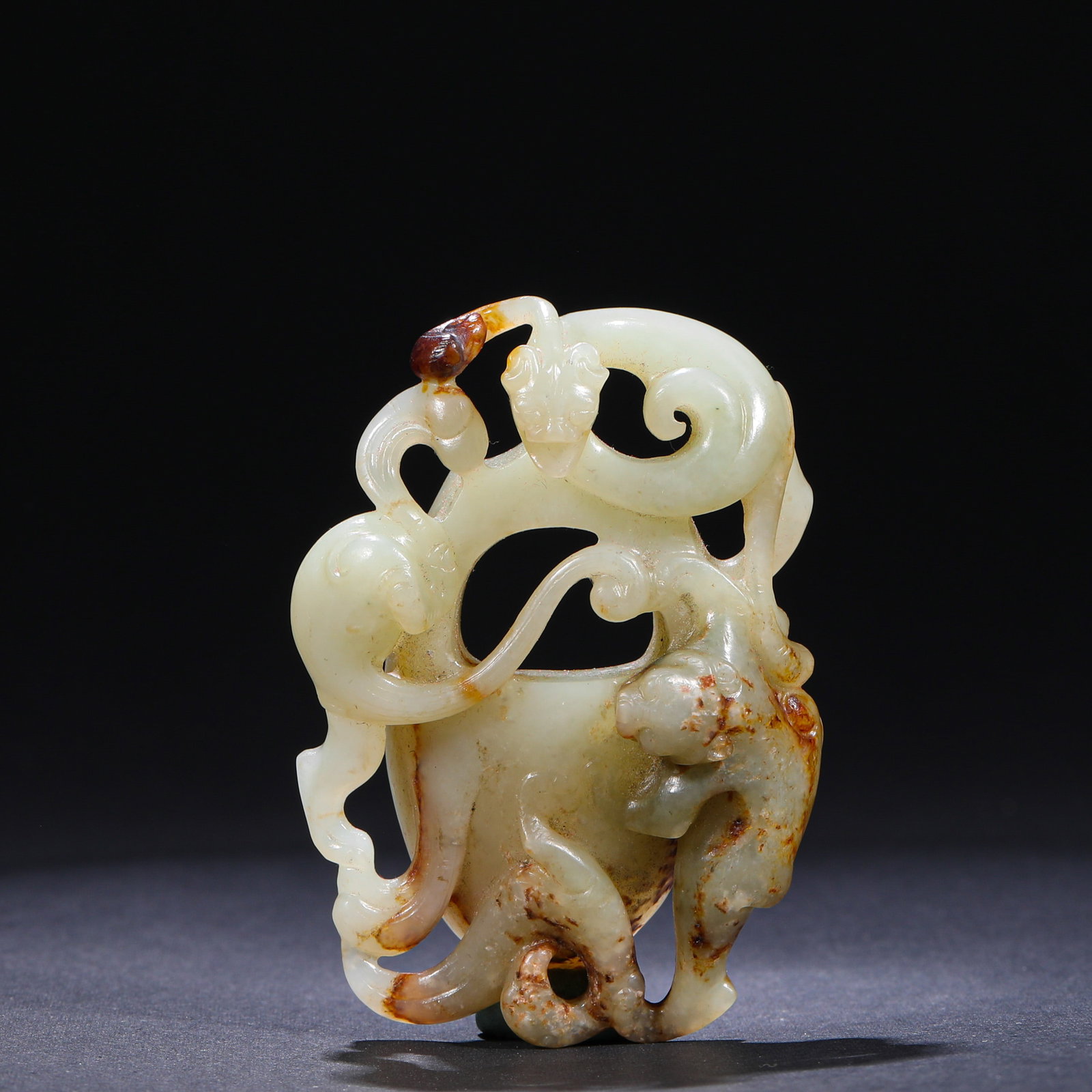 THREE AUSPICIOUS BEAST CHICKEN HEART PENDANT CARVED FROM HETIAN JADE OF THE HAN DYNASTY (1 of 7)