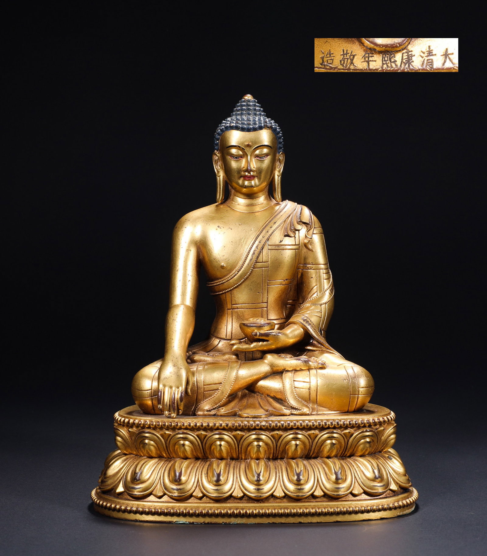 BRONZE GILDED BUDDHA STATUES OF EMPEROR KANGXI OF THE QING DYNASTY: Name BRONZE GILDED BUDDHA STATUES OF EMPEROR KANGXI OF THE QING DYNASTY Dimensions H:21cmW:15.8cmWeight:1510g Condition Additional photographs and condition reports are available
