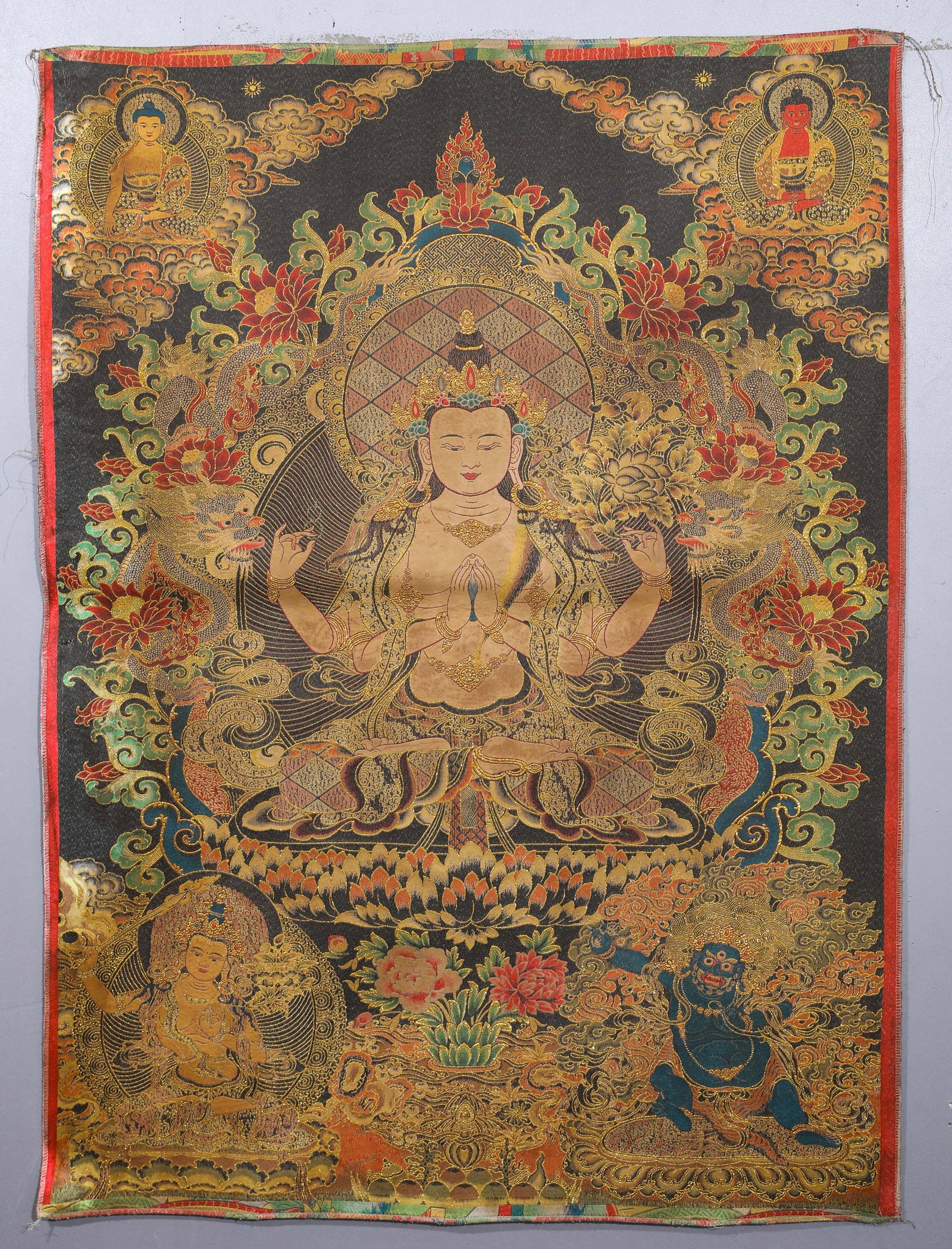 FOUR-ARMED GUANYIN BROCADE THANGKA: Name FOUR-ARMED GUANYIN BROCADE THANGKA Dimensions H:99cmW:72cmThis is a brocade Thangka of the Four-Armed Avalokiteshvara, a classic offering work symbolizing great compassion in Tibetan