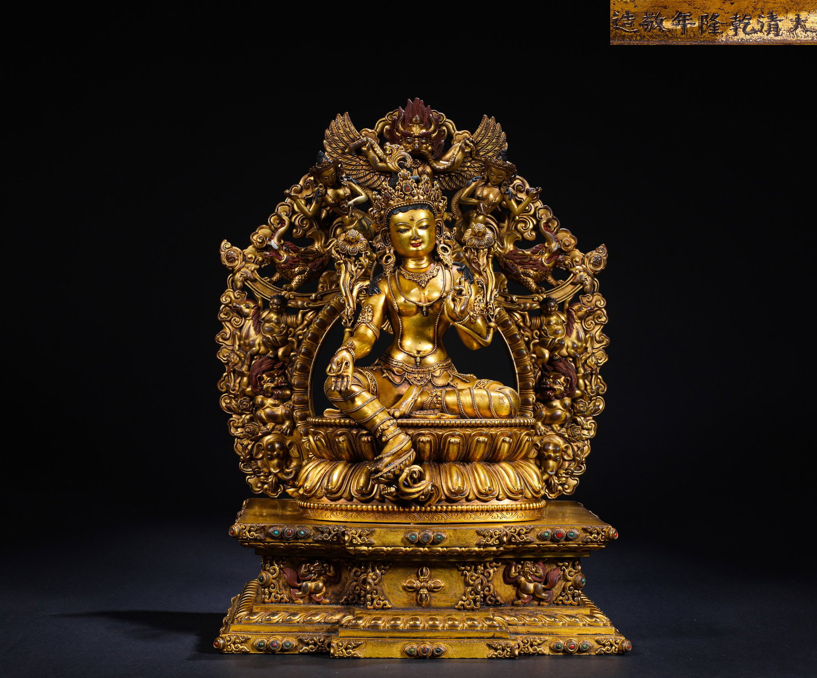 A GILDED BRONZE STATUE OF THE GREEN TARA IN THE QIANLONG PERIOD OF THE QING DYNASTY (1 of 11)