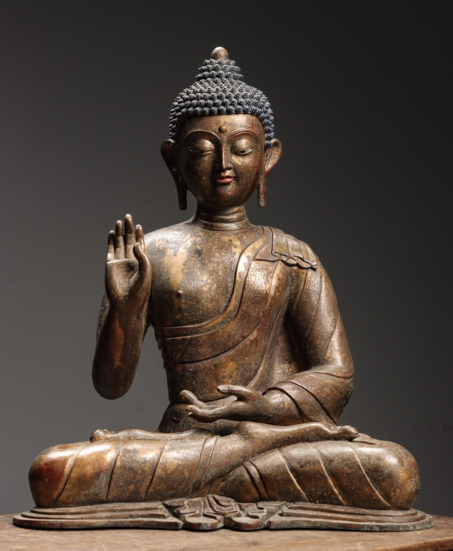 A GILDED BRONZE STATUE OF SAKYAMUNI FROM THE MING DYNASTY (1 of 10)