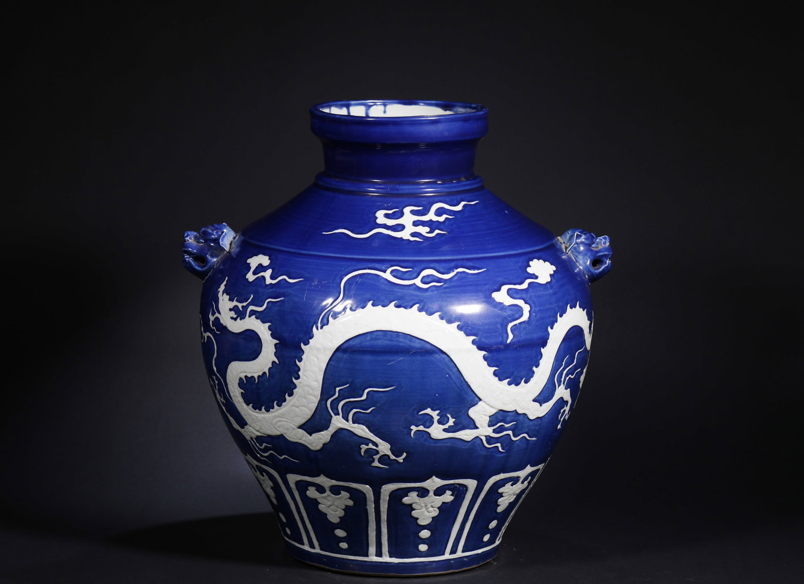 YUAN DYNASTY BLUE GLAZED JAR WITH WHITE DRAGON PATTERN LEFT BLANK: Name YUAN DYNASTY BLUE GLAZED JAR WITH WHITE DRAGON PATTERN LEFT BLANK Dimensions H:41cmD:36cm Condition Additional photographs and condition reports are available upon request as a