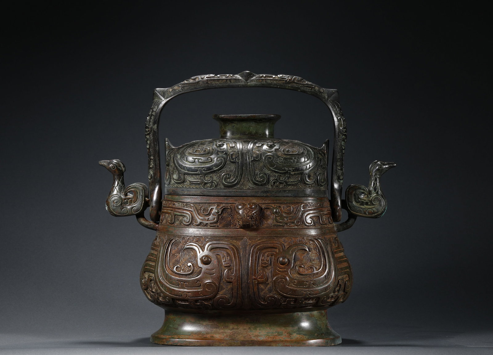 BRONZE TAOTIE PATTERN HANDLE POT OF THE SHANG DYNASTY (1 of 10)