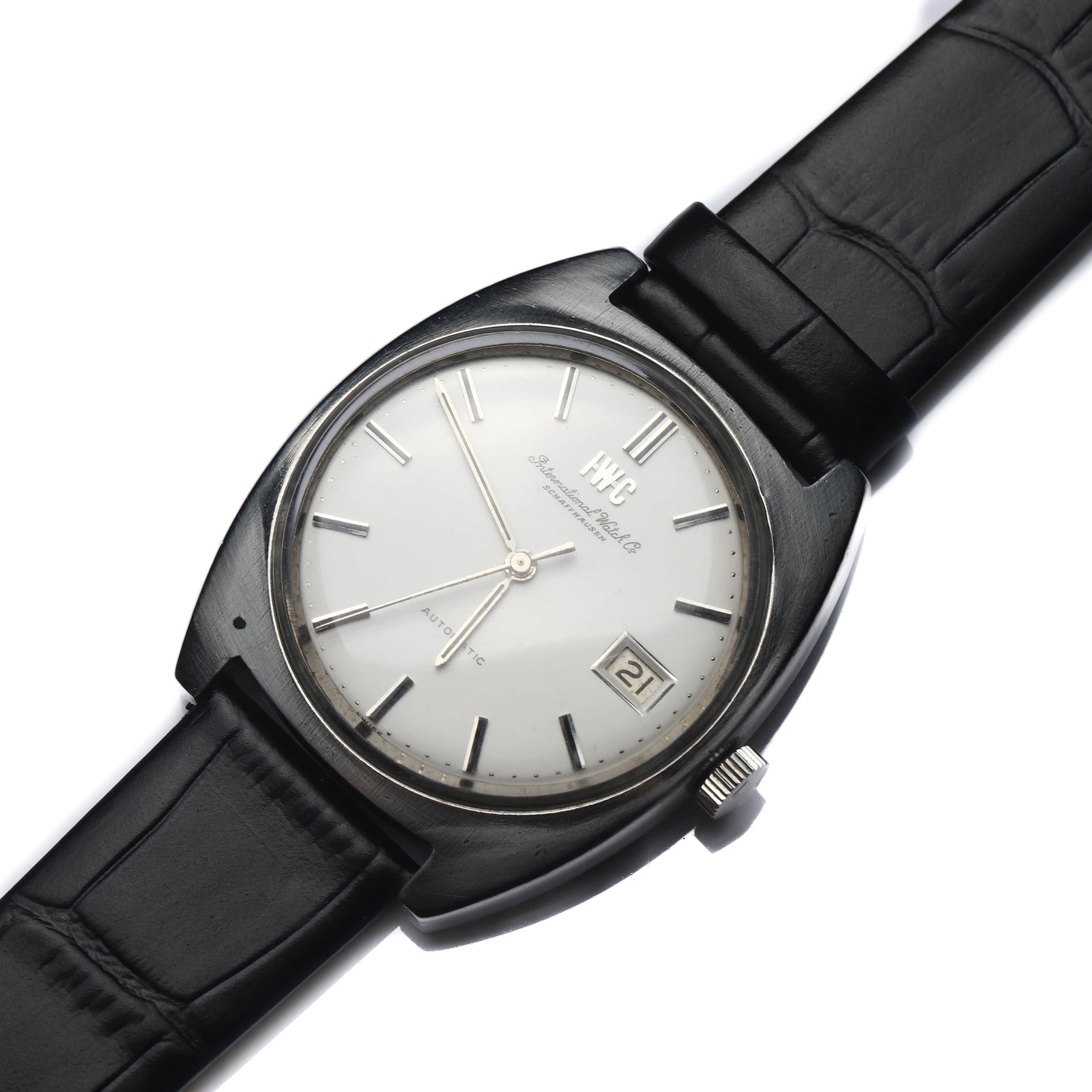 IWC AUTOMATIC DATE WRISTWATCH: Dimensions Dial diameter: 1 1/2 in (37.7 mm); Overall length: 9 7/16 in (24 cm) Description This wristwatch is identified as an IWC (International Watch Company) automatic date model, featuring a refi