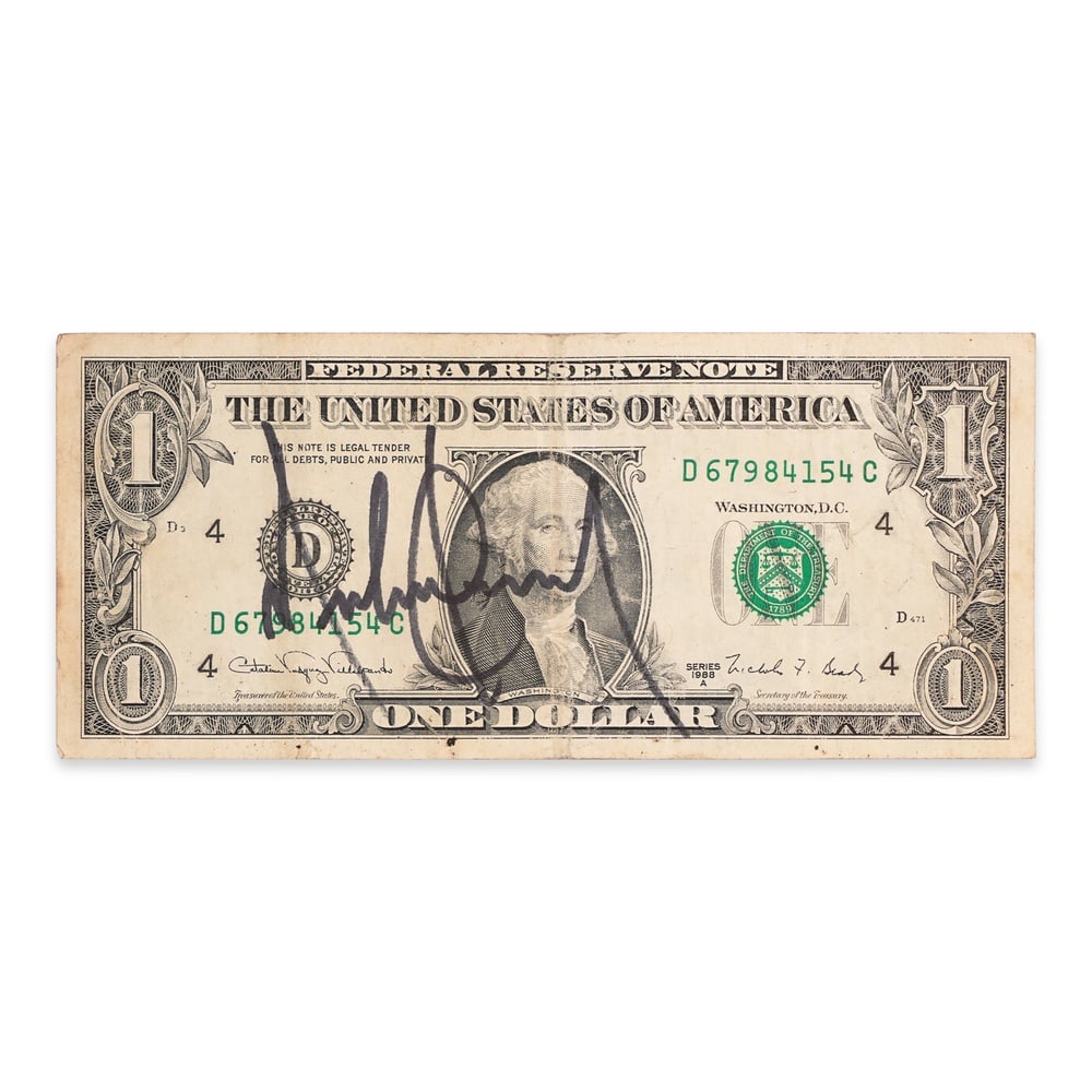 MICHAEL JACKSON SIGNED 1988 SERIES ONE DOLLAR FEDERAL RESERVE NOTE: 6 1/8 x 2 1/2 in (15.5 x 6.5 cm) Provenance and authentication: This collectible has undergone a rigorous forensic evaluation. The signatures were carefully analyzed across multiple criteria, includin