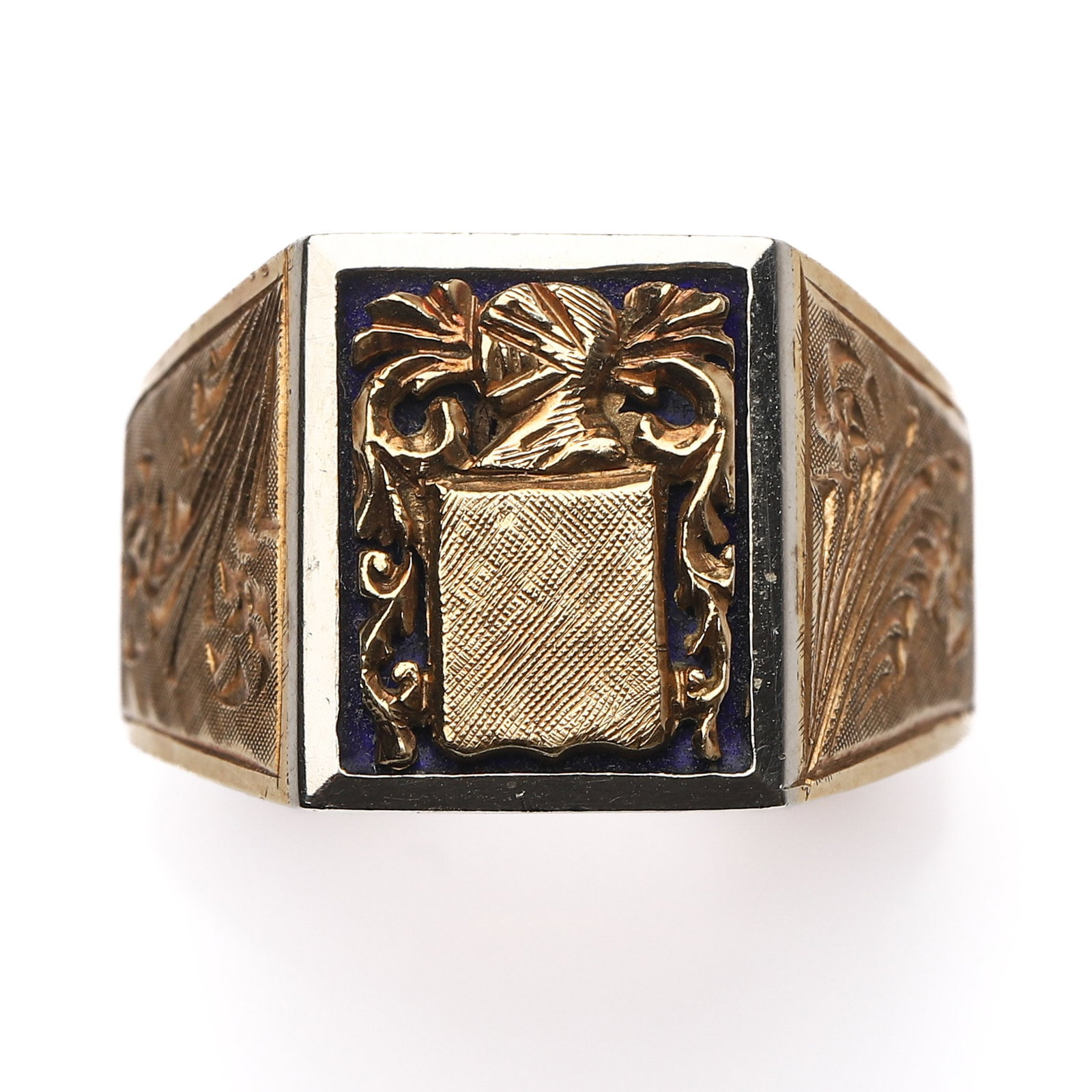 A GOLD SIGNET RING WITH ENGRAVED CREST PANEL: Dimensions Inner diameter: 3/4 in. (19.3 mm); Face length: 9/16 in. (14 mm); Face width: 1/2 in. (12.5 mm); Weight: 10.6 g Description: Of substantial form, this finely crafted signet ring in 18k gold