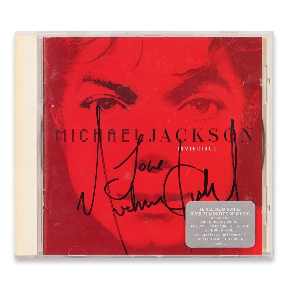 MICHAEL JACKSON SIGNED "INVINCIBLE" CD: 5 5/8 x 4 7/8 in (14.2 x 12.4 cm) Provenance and Authentication: This collectible has undergone a rigorous forensic evaluation. The signatures were carefully analyzed across multiple criteria, includi