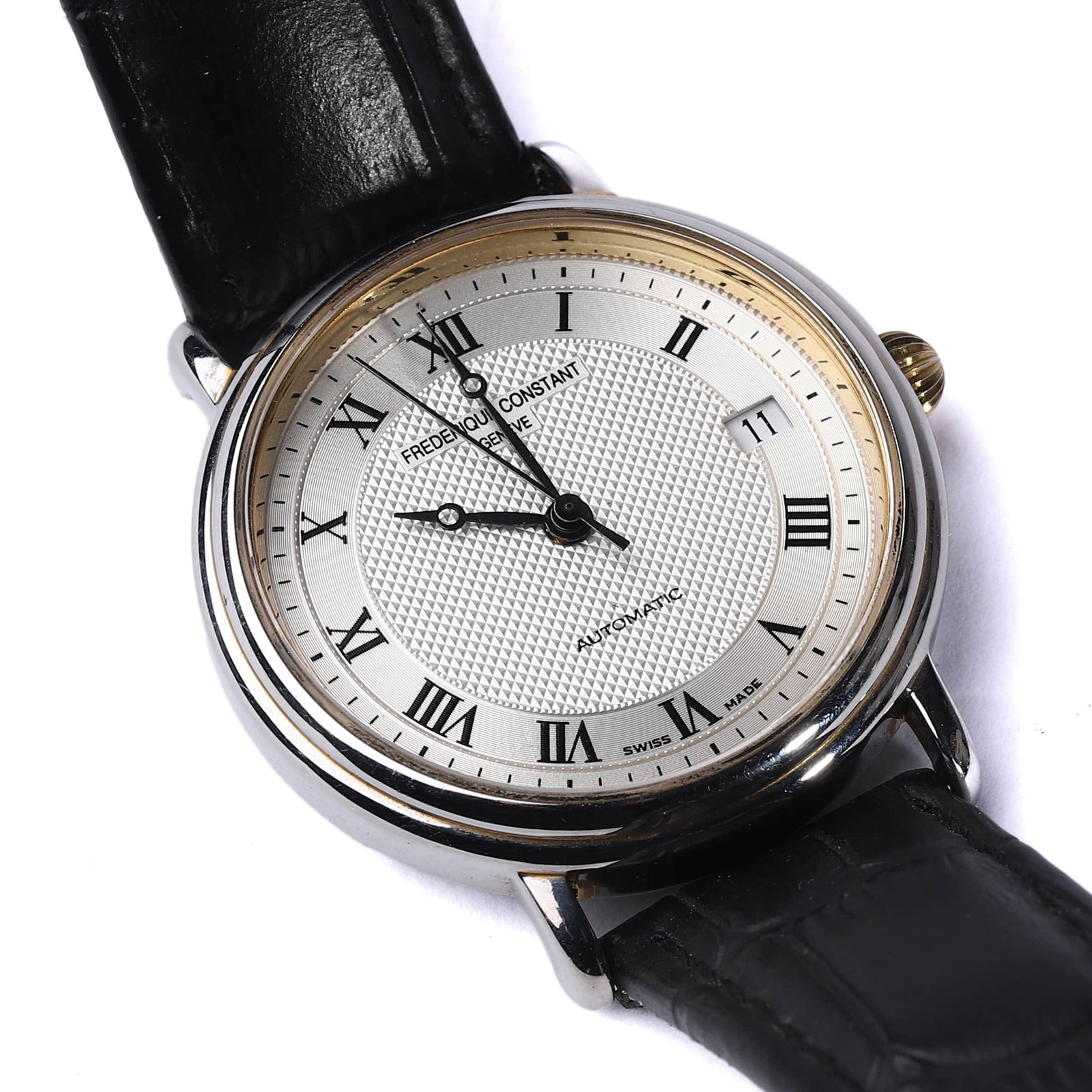 FREDERIQUE CONSTANT CLASSIC AUTOMATIC WRISTWATCH: Dimensions: Dial diameter: 1 7/16 in. (37 mm); Total length: 9 7/16 in. (24 cm) This Frederique Constant wristwatch showcases timeless Swiss elegance with its round silver-tone case, automatic movemen