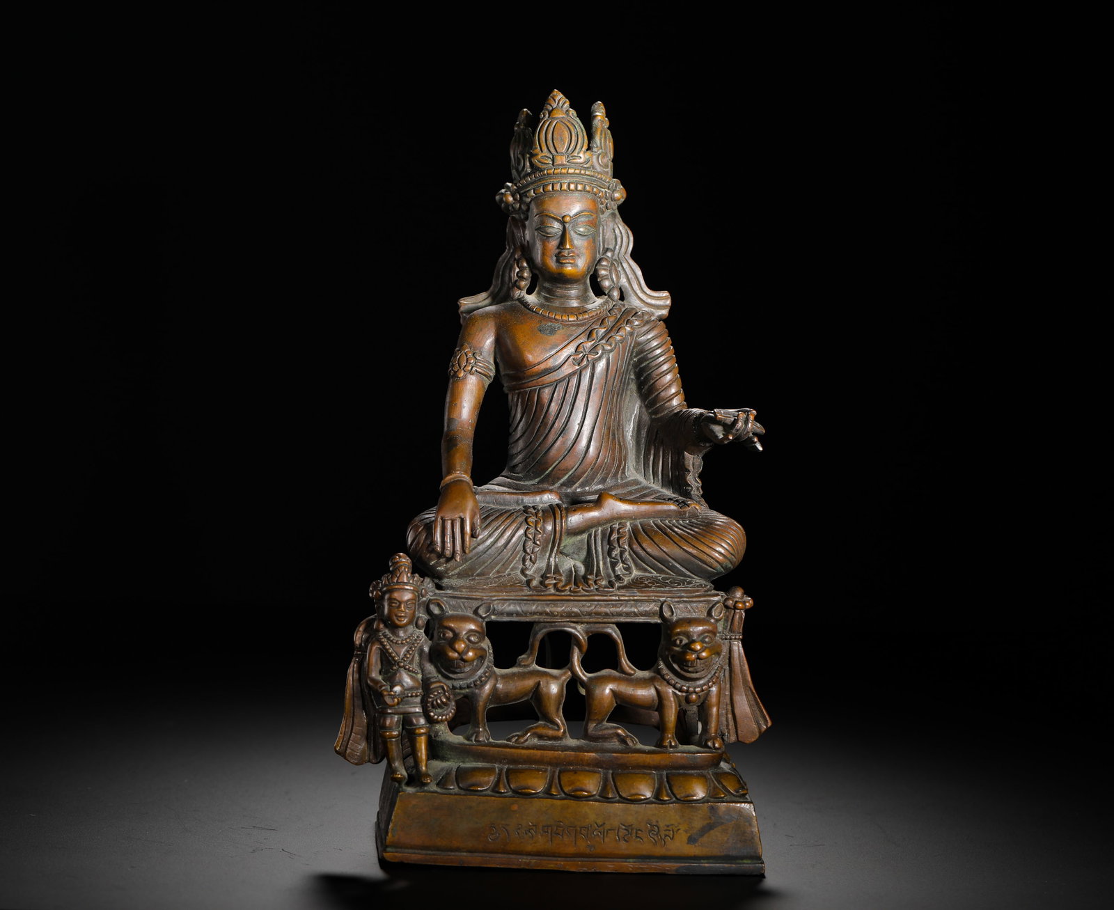 9TH CENTURY COPPER ALLOY SEATED STATUE OF SAKYAMUNI BUDDHA: H:23cm(9.06in) W:13cm(5.12in) Weight:1720g(3.79lb)The crowned Buddha sits in the lotus position, with his right hand touching the earth. The throne is supported by two lions, flanked by attendant figu