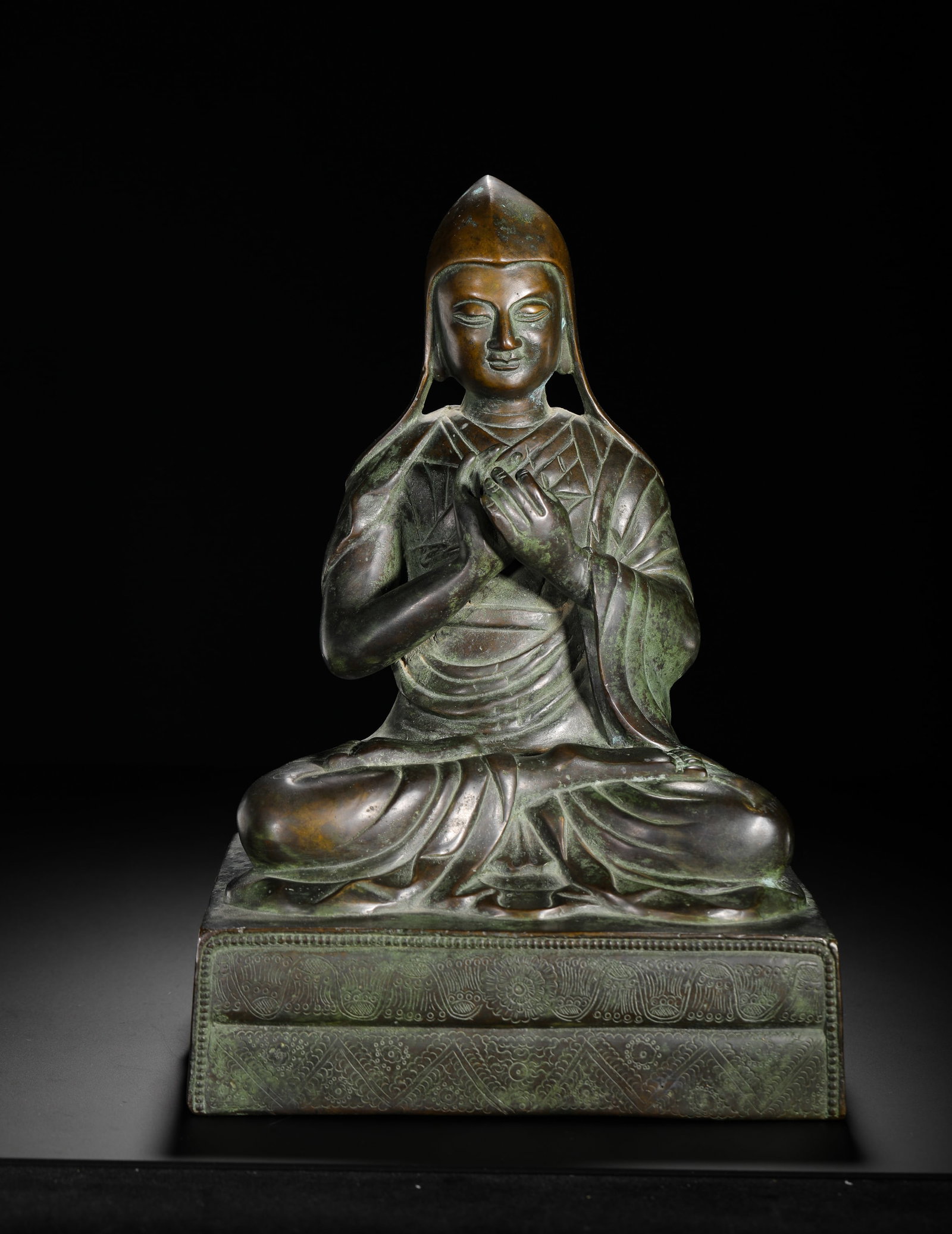 A SEATED STATUE OF MASTER TSONGKHAPA IN COPPER ALLOY FROM THE QING DYNASTY (1 of 12)
