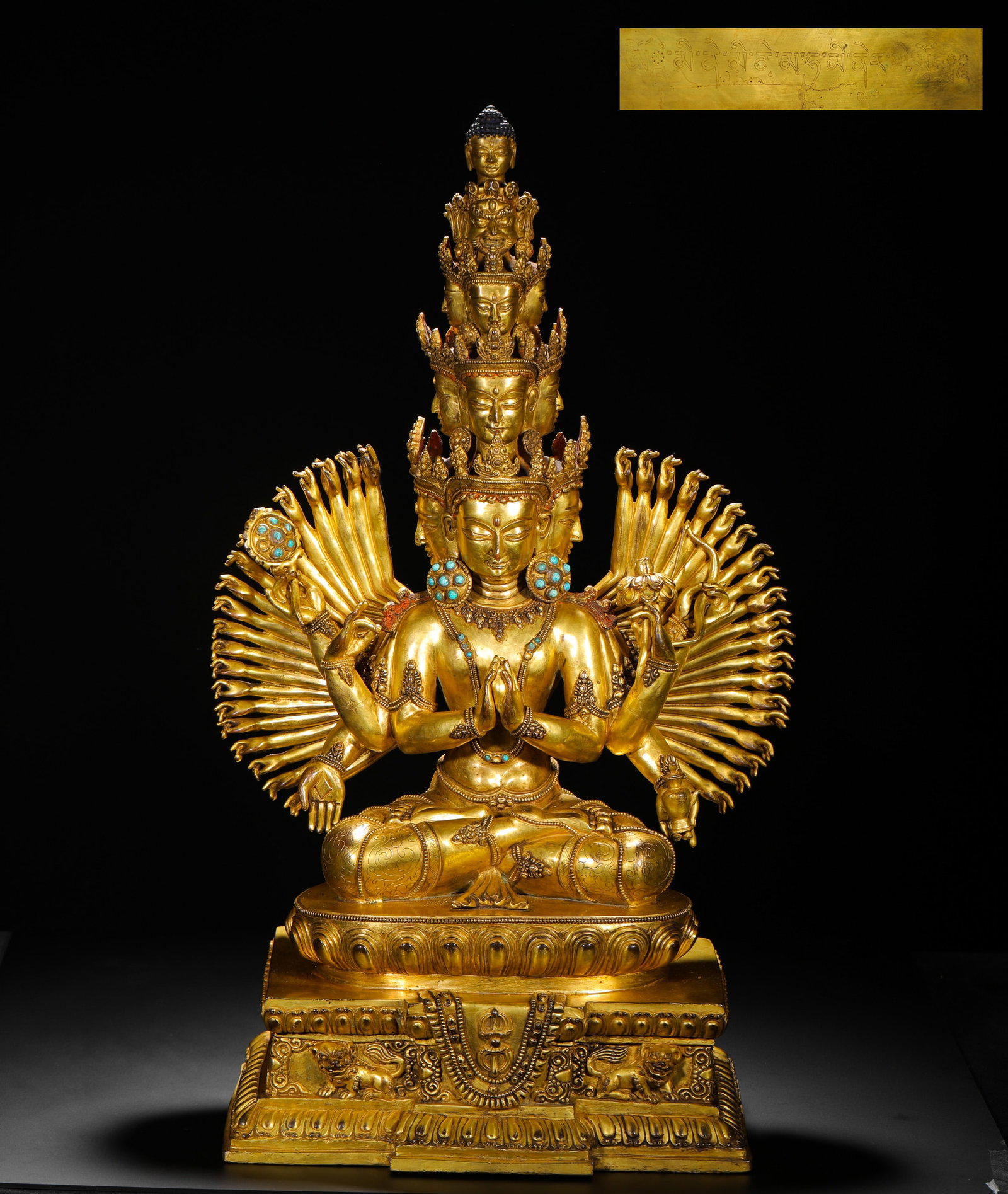 A GILDED BRONZE STATUE OF GUANYIN BODHISATTVA INLAID WITH TURQUOISE FROM THE QING DYNASTY: H:60cmW:29cmWeight:17300g This is a gilt bronze statue of Thousand-Armed and Thousand-Eyed Avalokiteshvara with turquoise inlay from the Qing Dynasty, representing a significant icon of great compassi
