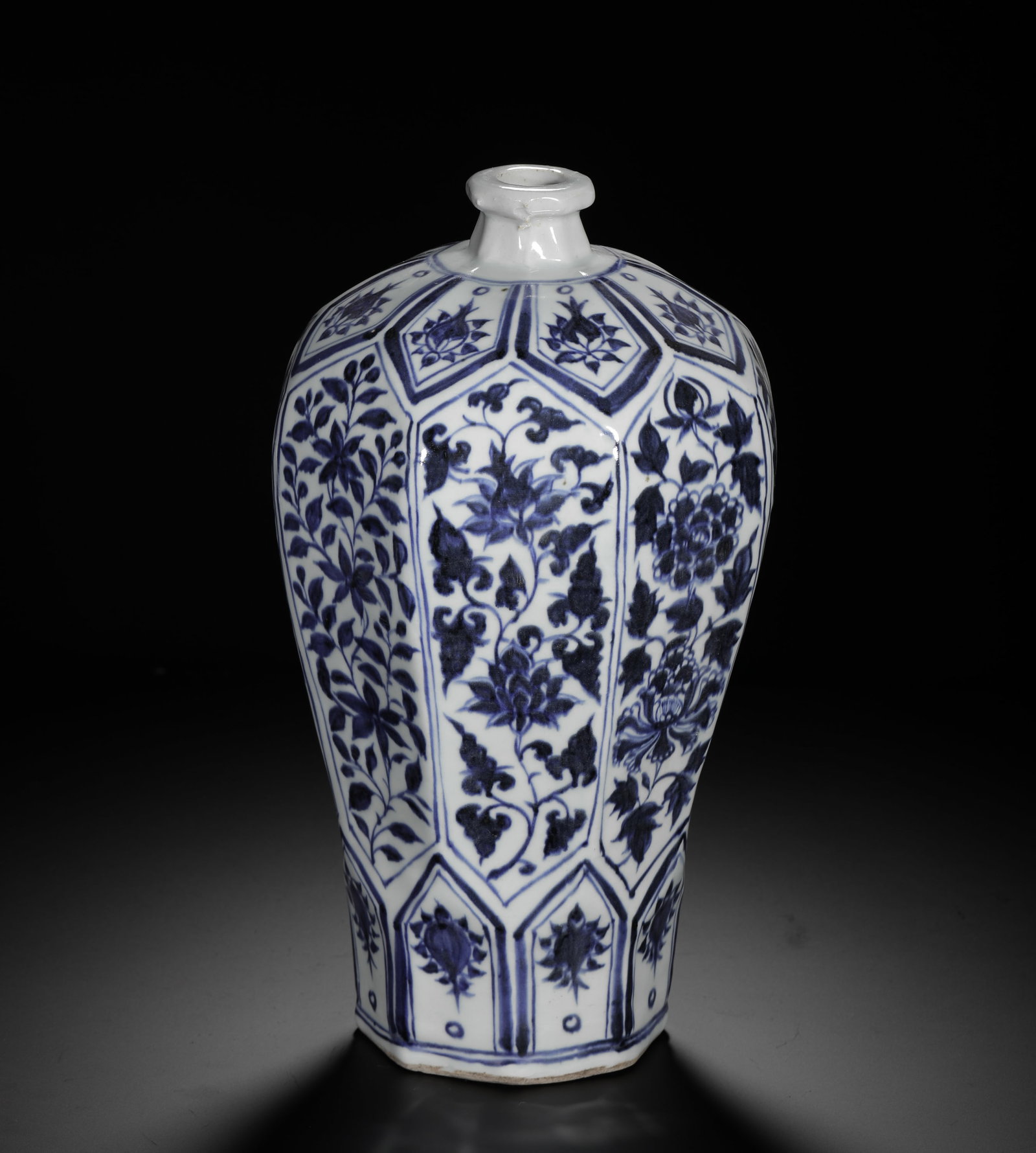 YUAN BLUE AND WHITE OCTAGONAL FLOWER PATTERNED PLUM VASE: H:35cmW:20cmWeight:2320g This is a Yuan Dynasty porcelain vase from the Jingdezhen Kiln. With an octagonal form, it is decorated with various floral motifs in rich, deep blue, exemplifying the