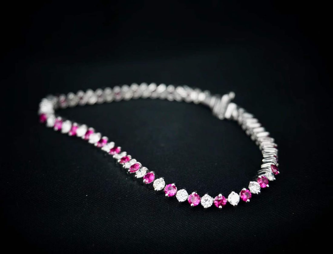 18 K WHITE GOLD RUBY DIAMOND TENNIS BRACELET (1 of 9)