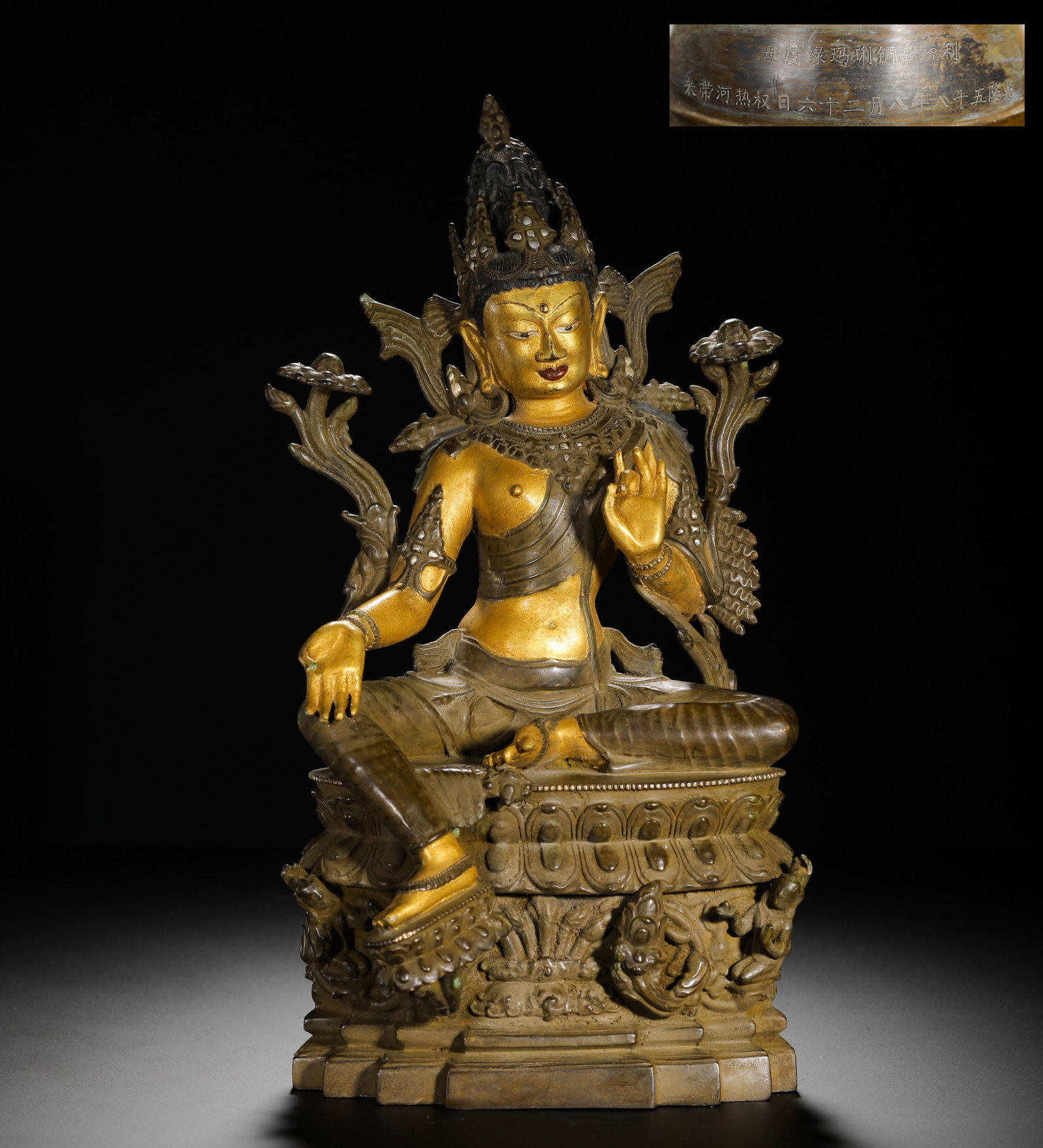A GILDED GREEN TARA STATUE FROM THE QING DYNASTY'S QIANLONG PERIOD: H:35cmW:17cmWeight:5480g This is a partially gilded bronze statue of Green Tara, crafted by the imperial workshop during the Qianlong reign of the Qing Dynasty, representing a significant icon of prot