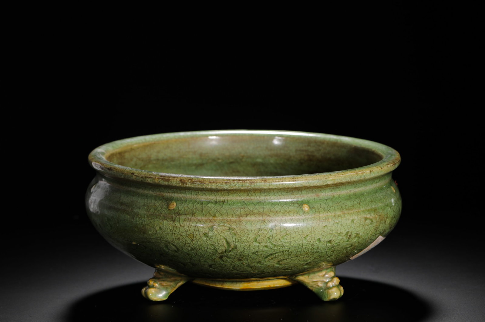 MING LONGQUAN KILN CELADON THREE-LEGGED FURNACE ENGRAVED WITH FLORAL PATTERNS (1 of 9)
