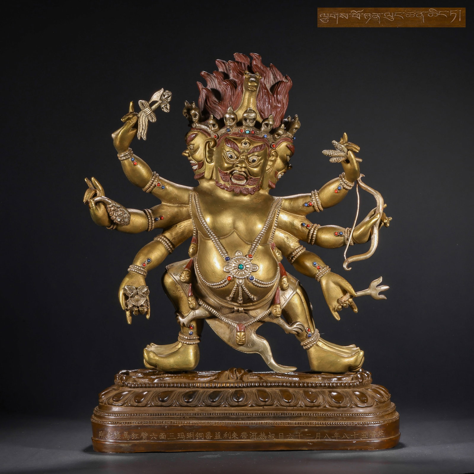 A GILDED BRONZE STATUE WITH A HORSE-HEAD VAJRA FROM THE QING DYNASTY: H:36.0cm(14.17in) W:25.5cm(10.04in) Weight:7500g(16.53lb)This statue is cast in bronze with gilding, depicting Hayagriva (Dharma King Horse Head), one of the important deities in Tibetan Buddhism, sym