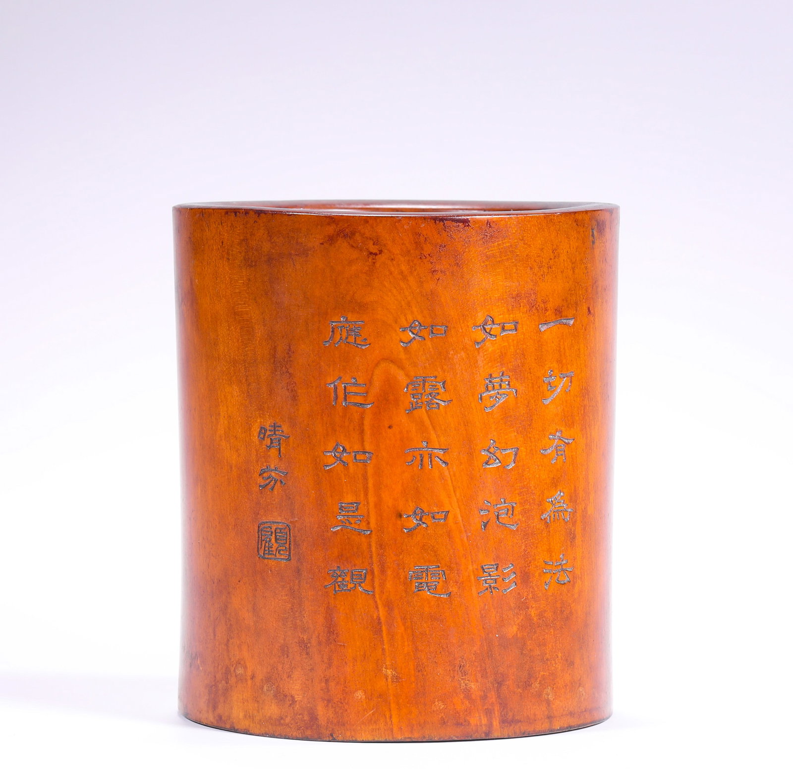 A BAMBOO PEN HOLDER DEPICTING THE ENLIGHTENMENT OF THE ARHATS IN THE QING DYNASTY: H:10.6cm(4.17in) D:9.3cm(3.66in) Weight:290g(0.64lb)This brush pot is a masterpiece of Jiading School bamboo carving in the Qing Dynasty. Carved from high-quality aged bamboo root, it features a warm