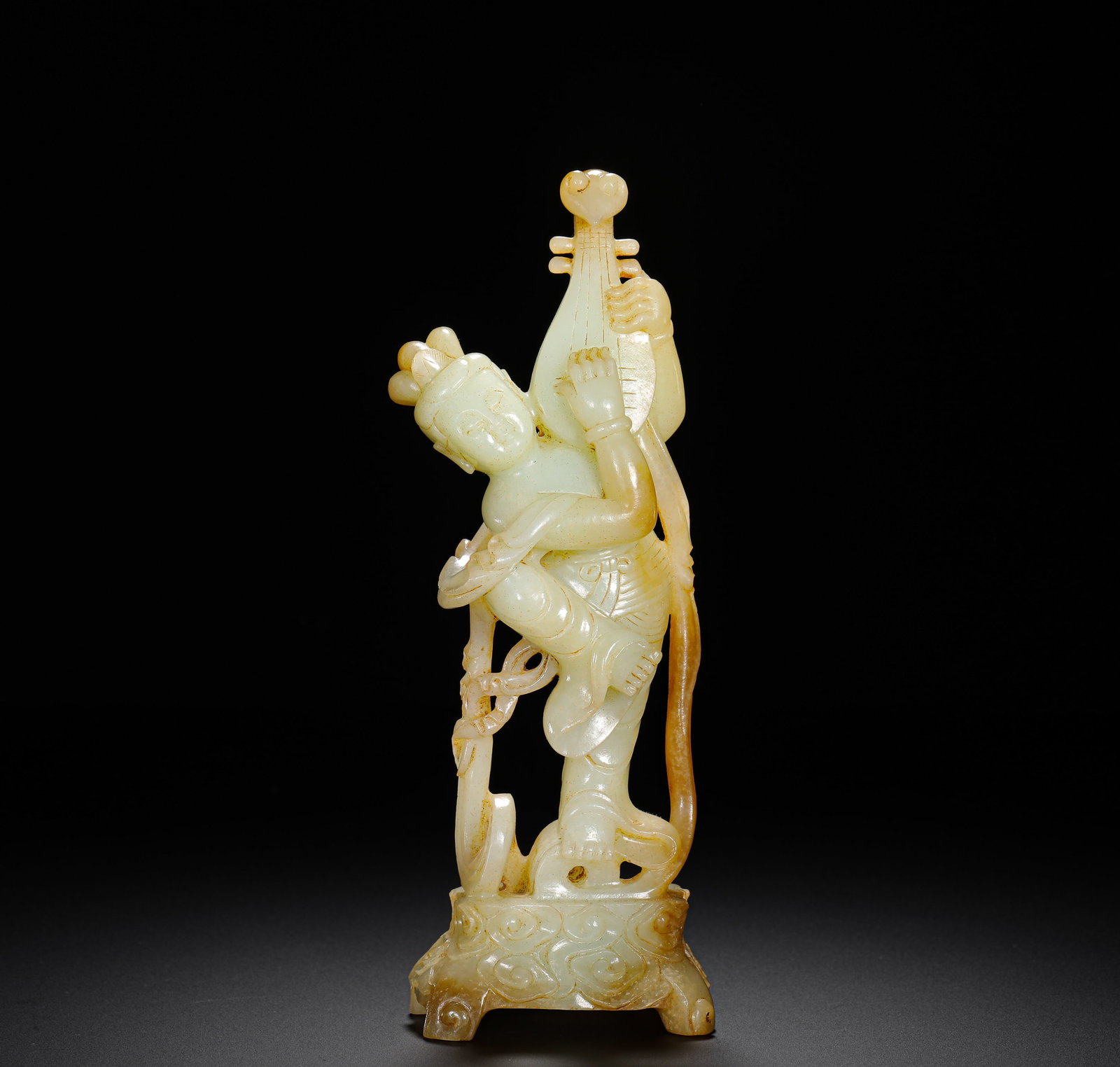 A NATURAL YELLOW INLAID THREE-DIMENSIONAL FIGURINE OF A FLYING FAIRY HOLDING A PIPA FROM HETIAN: H:18.8CMW:6.5CMWEIGHT:410GQING DYNASTY HETIAN WHITE JADE OPENWORK ORNAMENT OF FLYING APSARAS HOLDING PIPA WITH NATURAL RUSSET PATINA, NEATLY STYLED HAIR, ELEGANT FLOWING FIGURE AND WINDING RIBBONS, MO