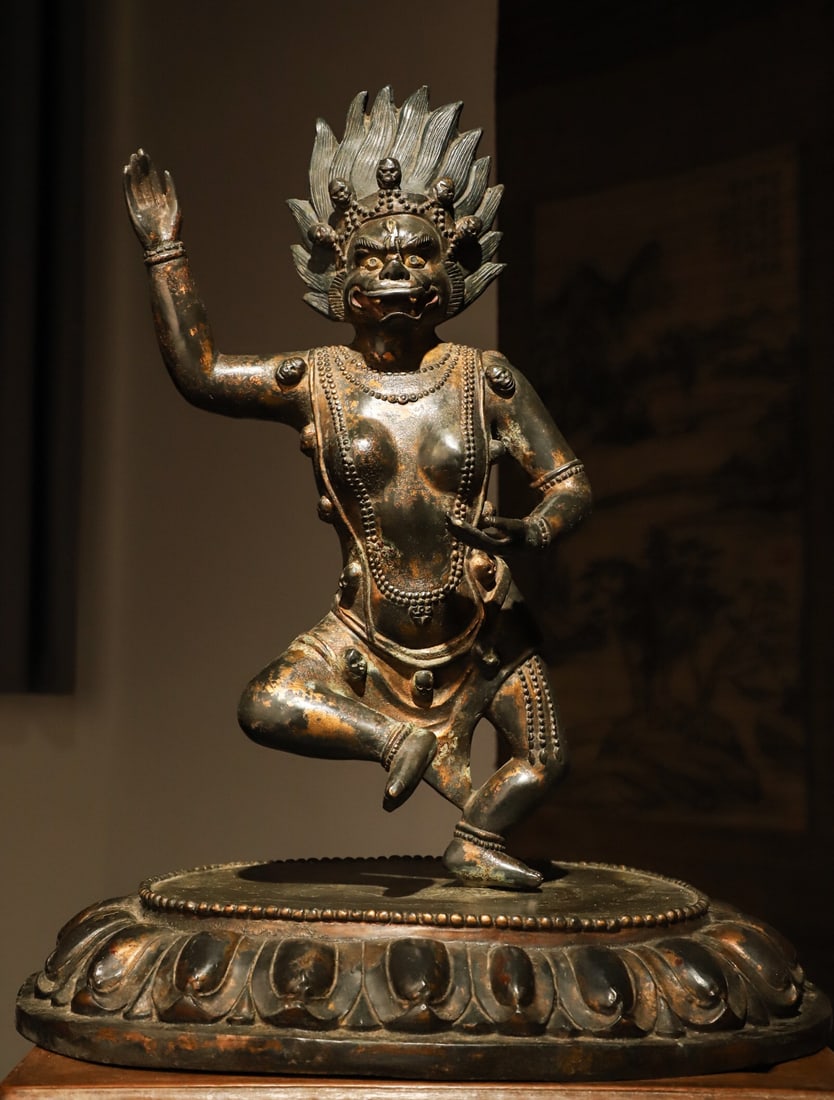 A LION-FACED BUDDHA MOTHER IN THE QING DYNASTY: WEIGHT:12000G (26.46LB) H:58CM (22.83IN) L:45CM (17.72IN) W:36CM (14.17IN) THIS IS A GILDED BRONZE STATUE OF THE TIBETAN BUDDHIST VAJRAVARAHI (DAKINI) FROM THE QING DYNASTY, WITH A POWERFUL AND DYNAMI