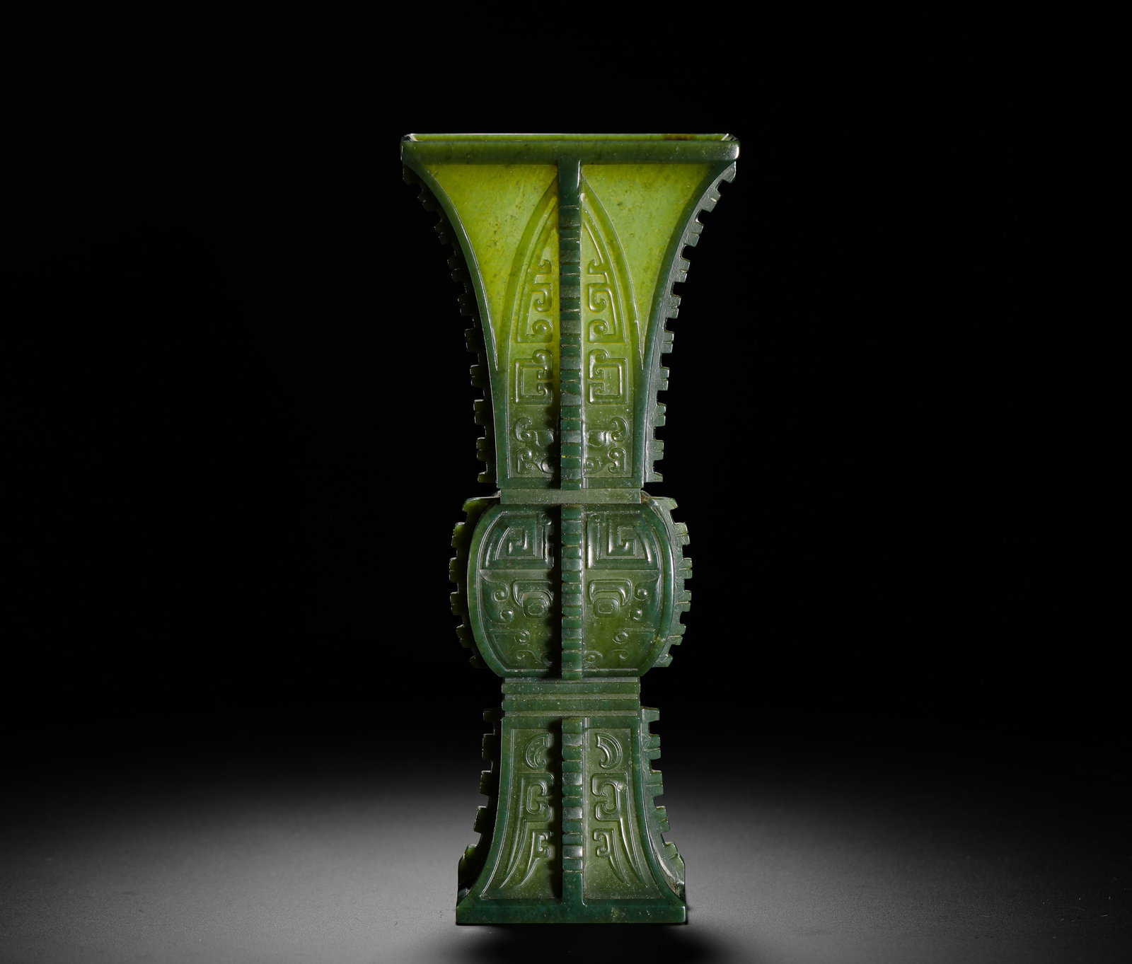 QING DYNASTY HETIAN JADEITE FAUX BEAST FACE SQUARE HALBERD : H:23.5CMW:10.5CMWEIGHT:410GQING DYNASTY SQUARE HETIAN SPINACH JADE ARCHAIC GU VASE WITH BEAST MASK AND SPIRAL PATTERNS, MODELED AFTER SHANG-ZHOU BRONZE GU WITH FLANGED EDGES ON FOUR SIDES, CRAFTED FRO