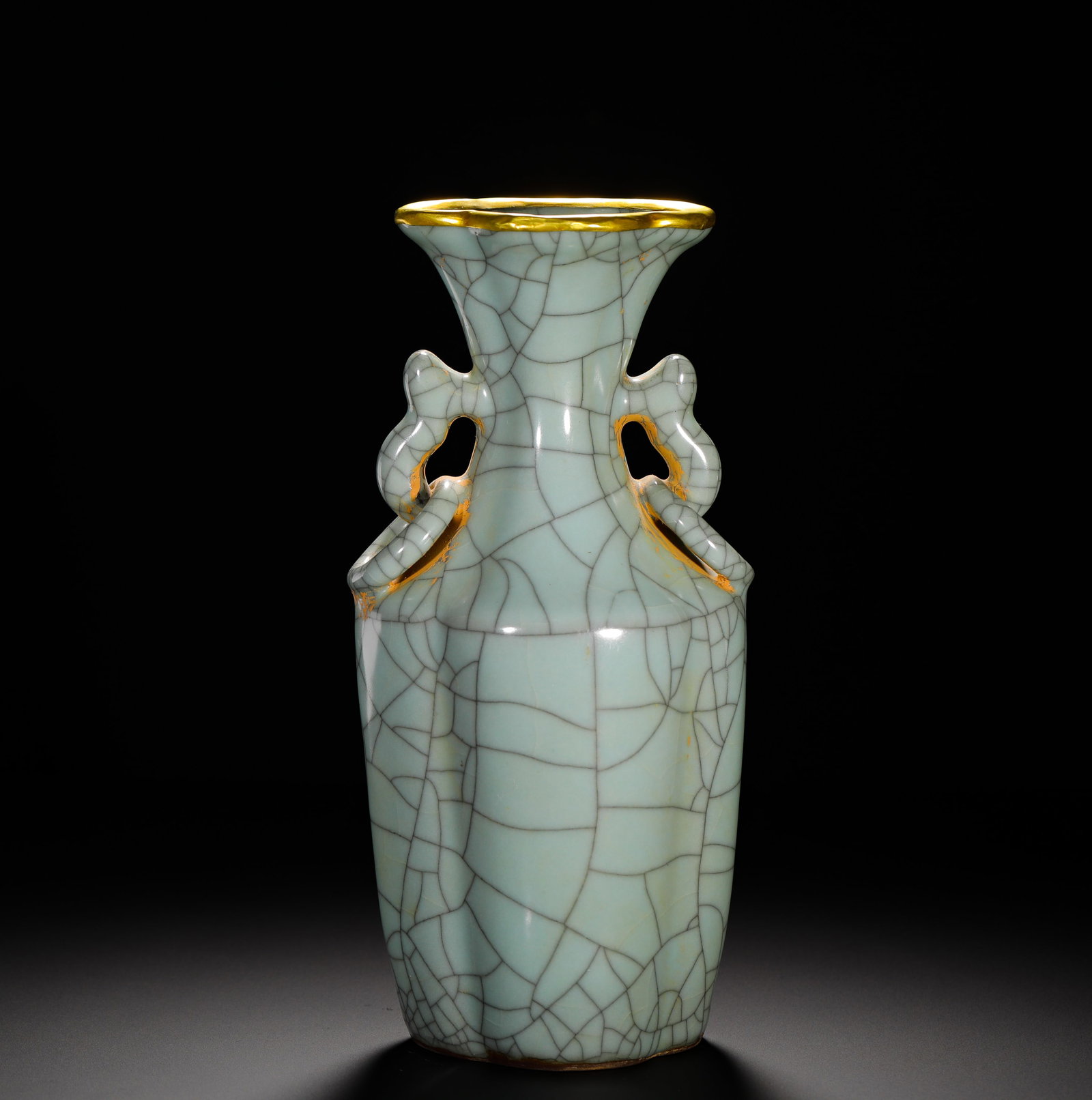 SONG DYNASTY OFFICIAL KILN POWDER BLUE GLAZED RUYI EAR GOURD-SHAPED VASE: HEIGHT:24.5CM (9.65IN) WIDTH:12CM (4.72IN) WEIGHT:1100G (2.42LB) OFFICIAL KILN MELON RIBBED VASE WITH RUYI HANDLES AND GILT RIM, SONG DYNASTY. SHAPED AS EIGHT MELON RIBS, FULLY COVERED IN EVEN PALE CE