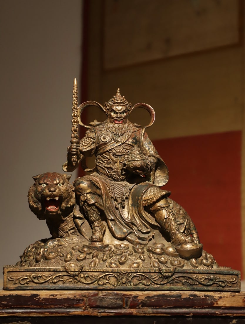 A GILDED BRONZE STATUE OF ZHAO GONGMING FROM THE MING DYNASTY: WEIGHT:2312G.H:22CML:23CMW:13CM