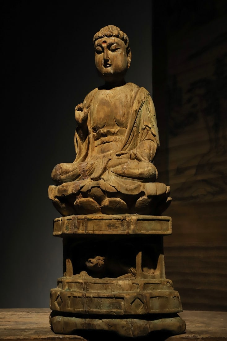 SAKYAMUNI BUDDHA OF THE SONG DYNASTY: H: 62CML:25CMW:16CM SAKYAMUNI BUDDHA IS THE FOUNDER OF BUDDHISM. THIS STATUE IS NOT ONLY A CARRIER OF RELIGIOUS BELIEFS, BUT ALSO A TANGIBLE WITNESS OF THE DEEP INTEGRATION OF ANCIENT CHINESE WOODCARV