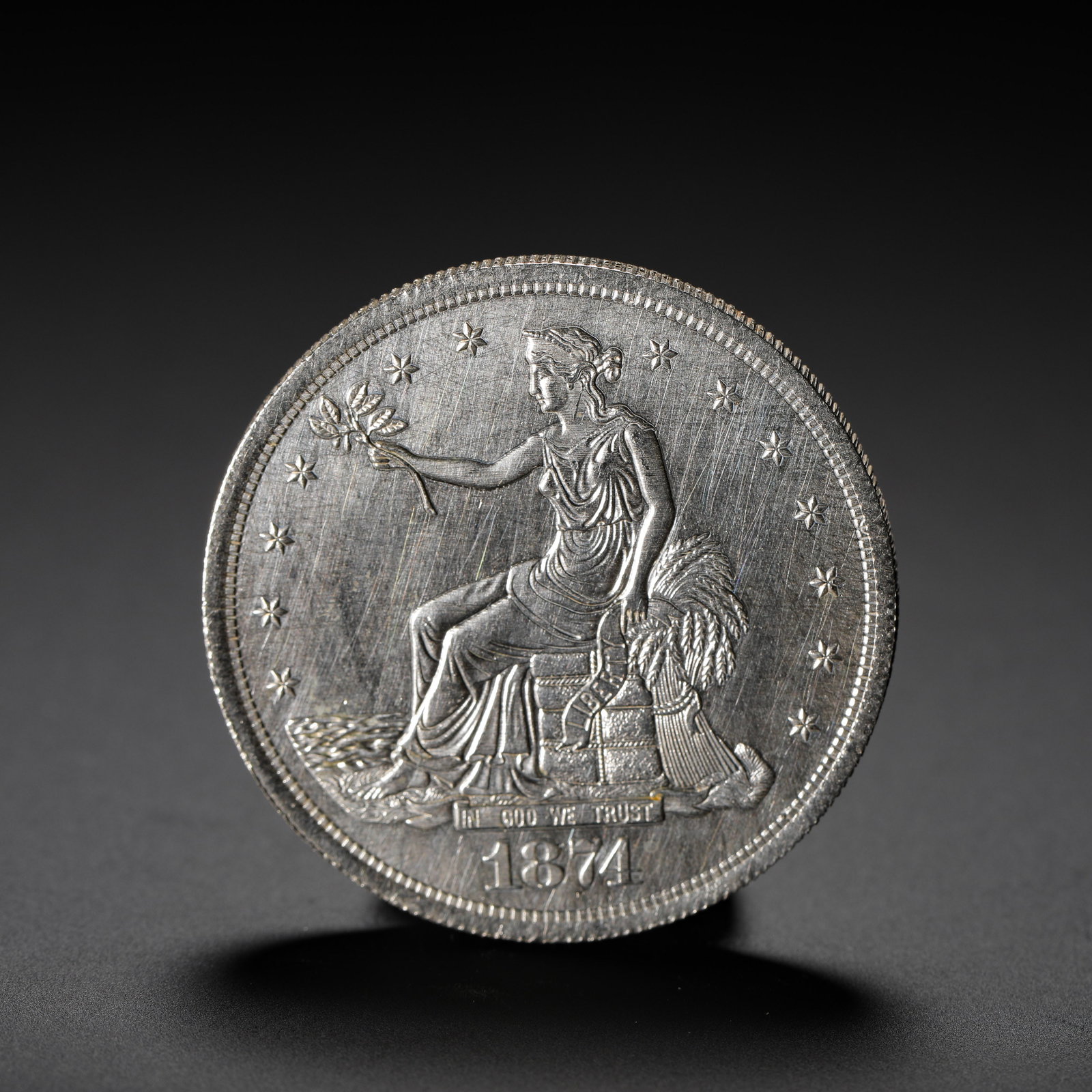 AMERICAN SILVER DOLLAR: D:3.9CM (1.54IN) WEIGHT:27G (0.06LB) A SILVER COIN ISSUED BY THE UNITED STATES SPECIFICALLY FOR EAST ASIAN TRADE MARKETS. THE 1874 ISSUE IS A MID-PERIOD RELEASE IN THE SERIES, SERVING AS AN IMPORTANT 