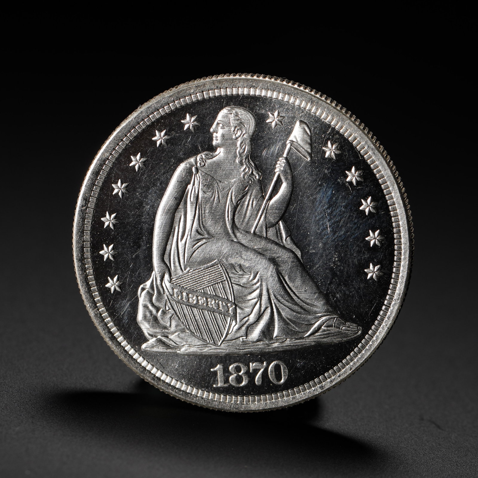 AMERICAN SILVER DOLLAR: D:3.9CM (1.54IN) WEIGHT:27G (0.06LB) A LATE-PERIOD ISSUE OF THE SEATED LIBERTY SILVER DOLLAR SERIES, AND ONE OF THE FINAL YEARS WITHOUT THE NATIONAL MOTTO "IN GOD WE TRUST", AN IMPORTANT CIRCULATING S