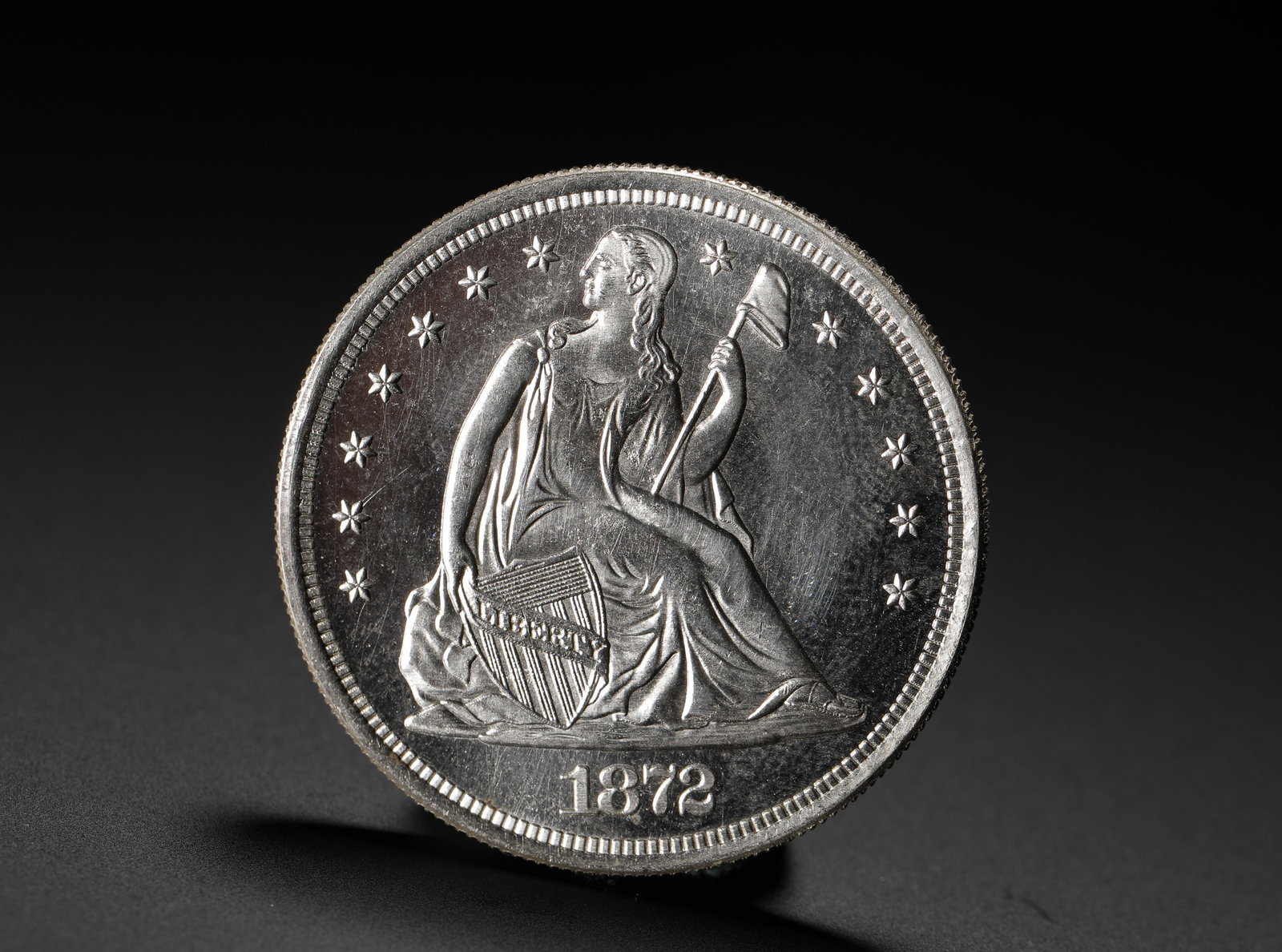 AMERICAN SILVER DOLLAR: D:3.9CM (1.54IN) WEIGHT:27G (0.06LB) A KEY LATE-PERIOD ISSUE OF THE SEATED LIBERTY SILVER DOLLAR SERIES, MINTED IN THE PENULTIMATE YEAR BEFORE THE SERIES' DISCONTINUATION, CARRYING BOTH HISTORICAL TRA