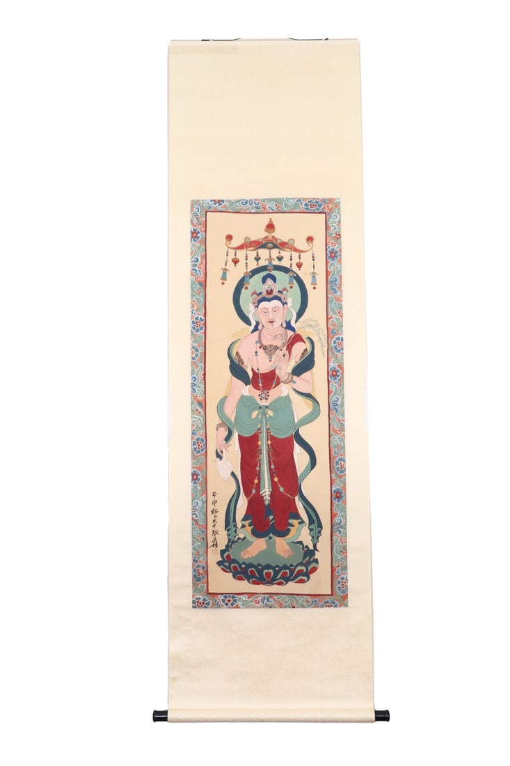 ZHANG DAQIAN (1899-1983) DUNHUANG STYLE GUANYIN VERTICAL SCROLL: H:123CM (48.43IN) W:39CM (15.35IN) THIS VERTICAL SCROLL OF GUANYIN IN DUNHUANG STYLE WAS PAINTED BY ZHANG DAQIAN. WITH RICH AND ELEGANT COLORS, IT REPRODUCES THE STATUES OF DUNHUANG MURALS WITH DELICA