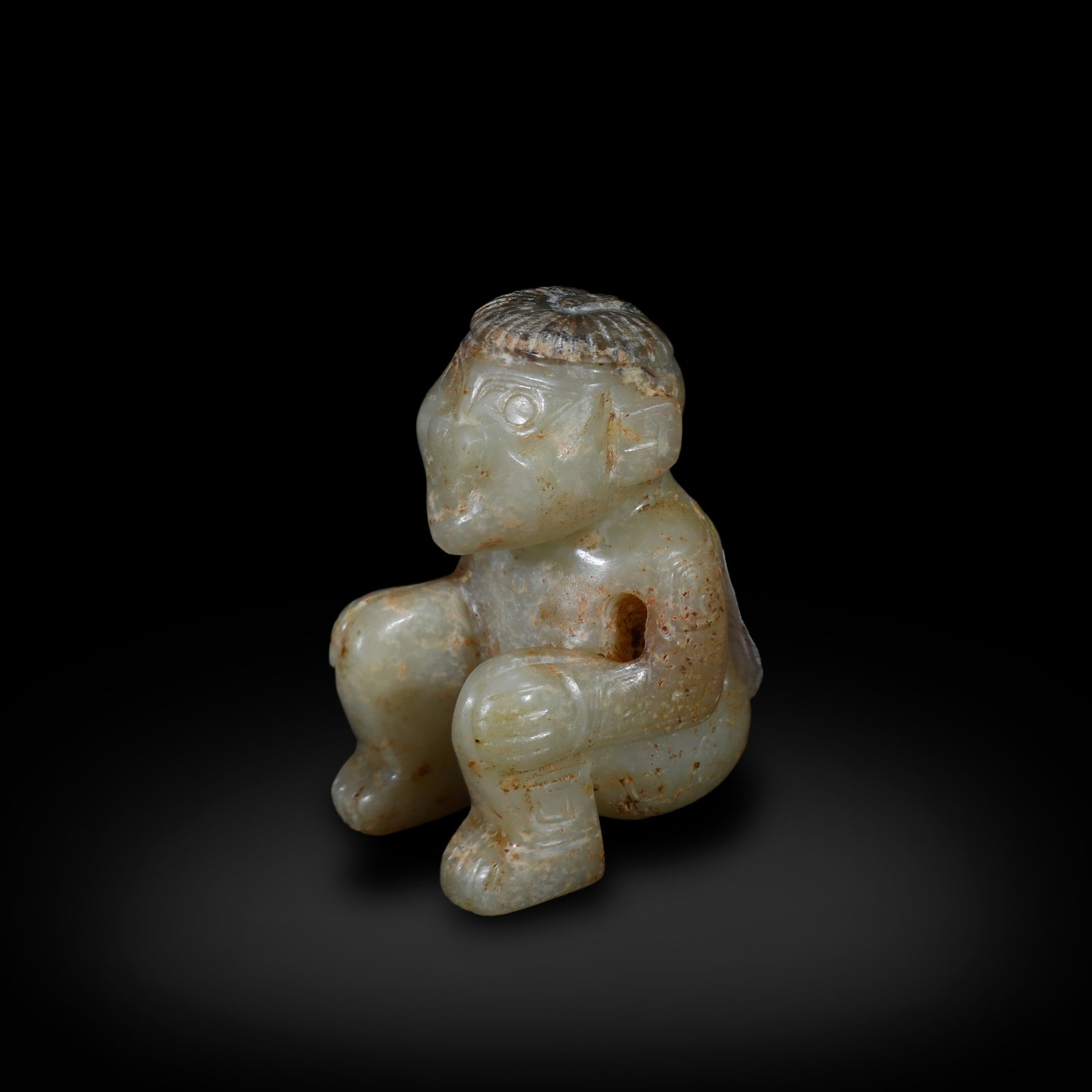 Shang Dynasty Jade human figure: H:5cm W:3.7cm