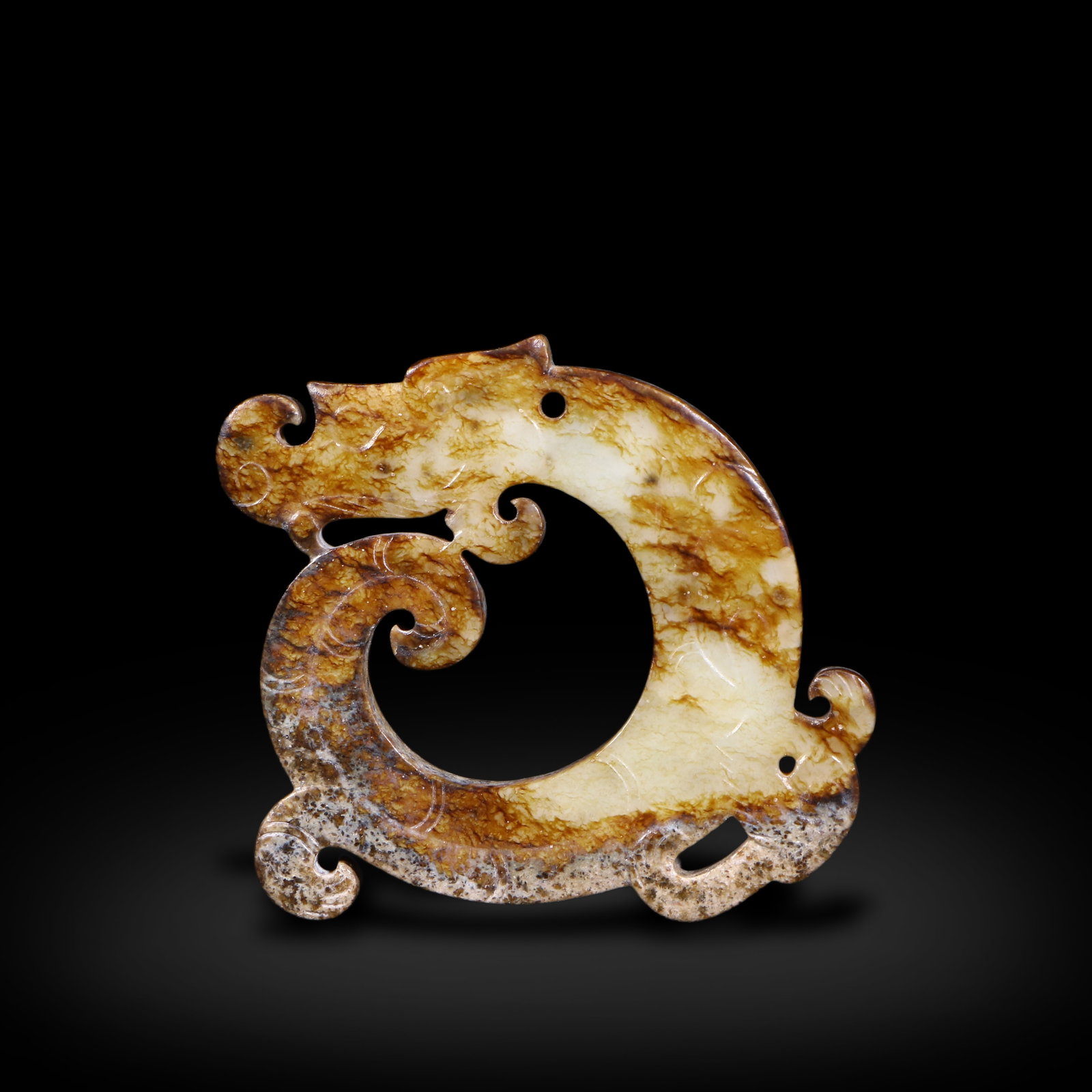 Warring States Period Dragon-shaped jade pendant: H:5.8cm W:6.2cm