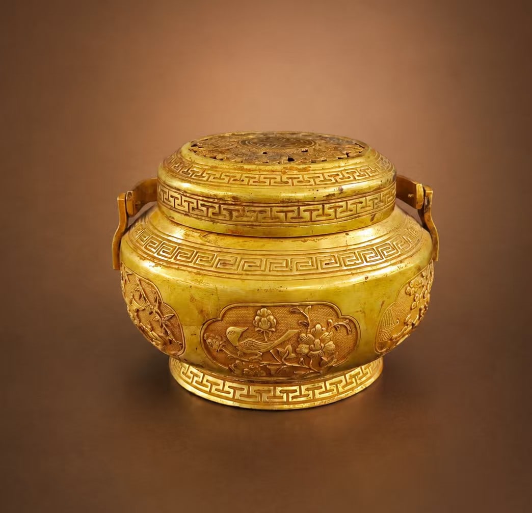 Tang Dynasty Gilded Silver Hand Warmer Chased with Flower and Bird Patterns (1 of 7)